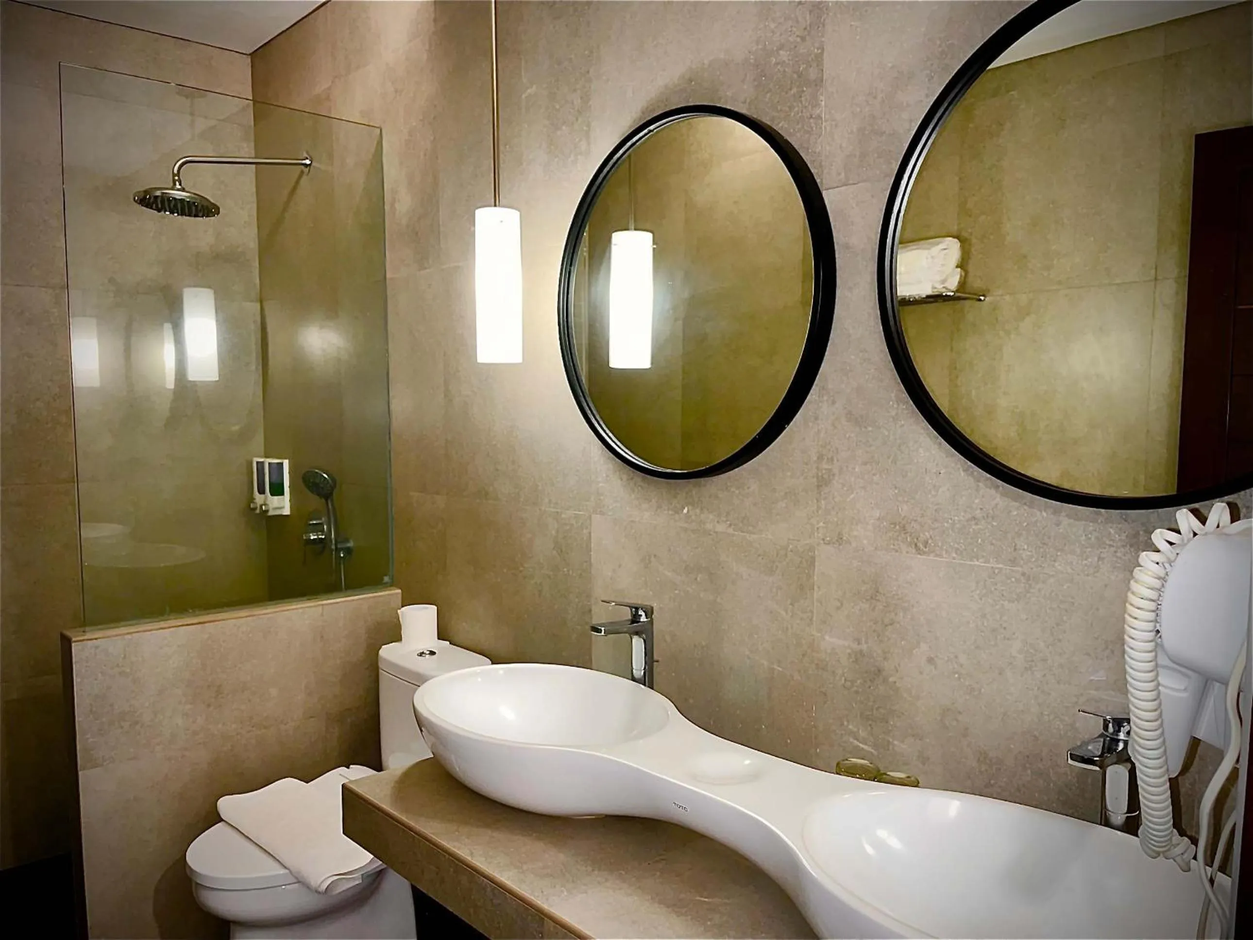 Shower in Yulia Beach Inn Kuta