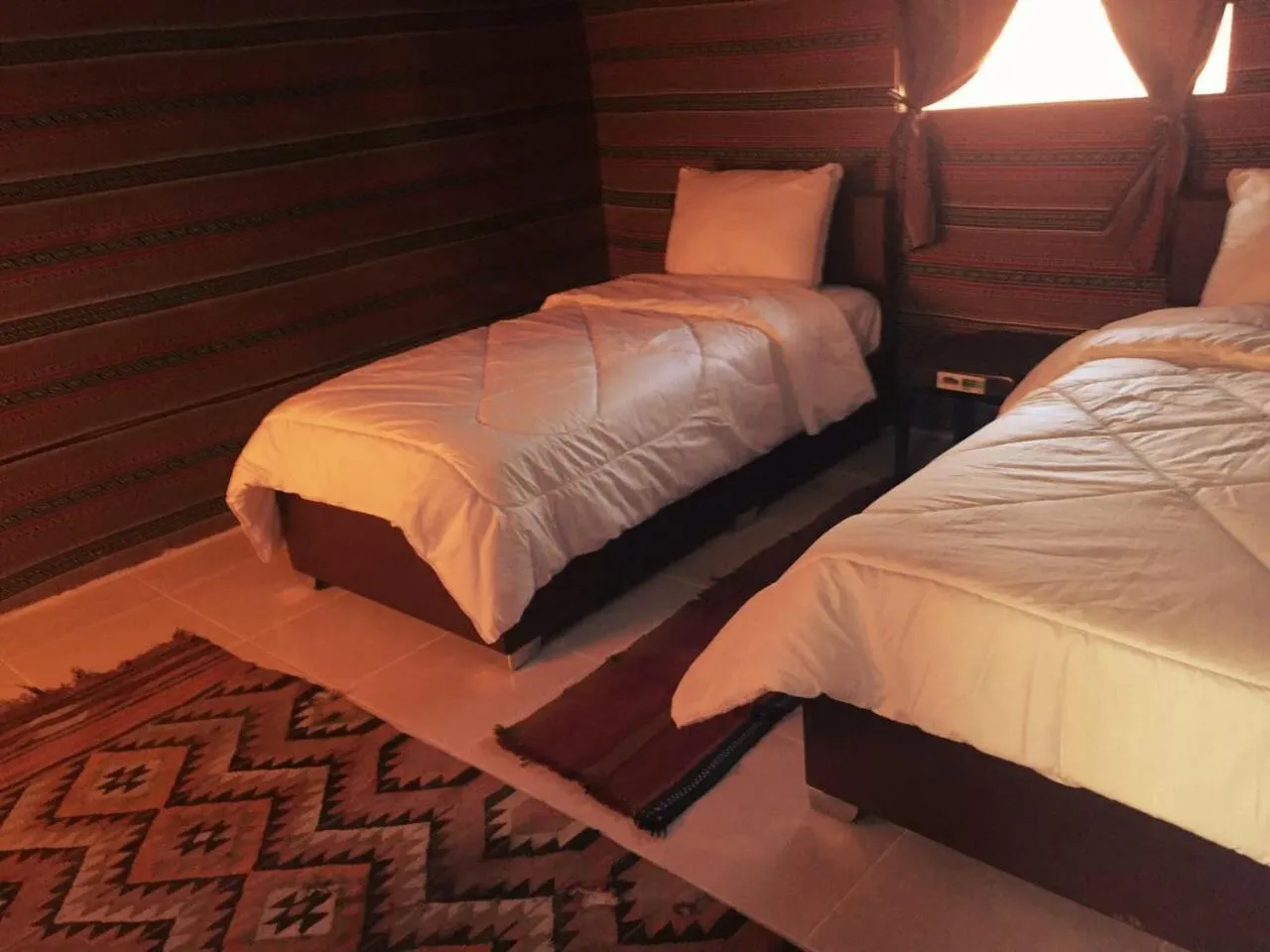 Bed in Beyond Wadi Rum Camp