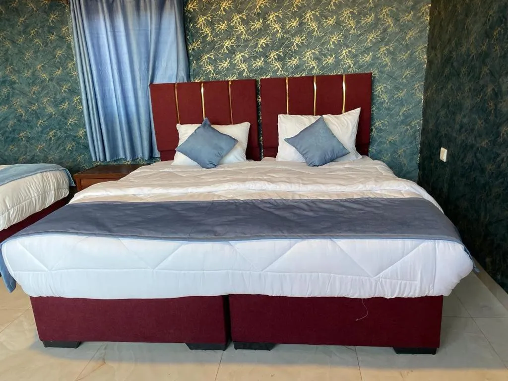 Bed in Beyond Wadi Rum Camp