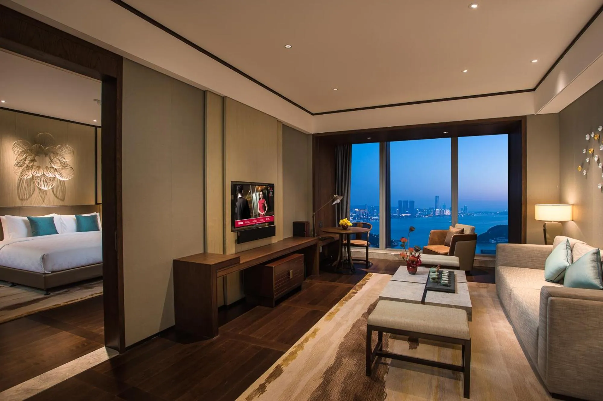 Living room, Bed in HUALUXE Xiamen Haicang Habour View