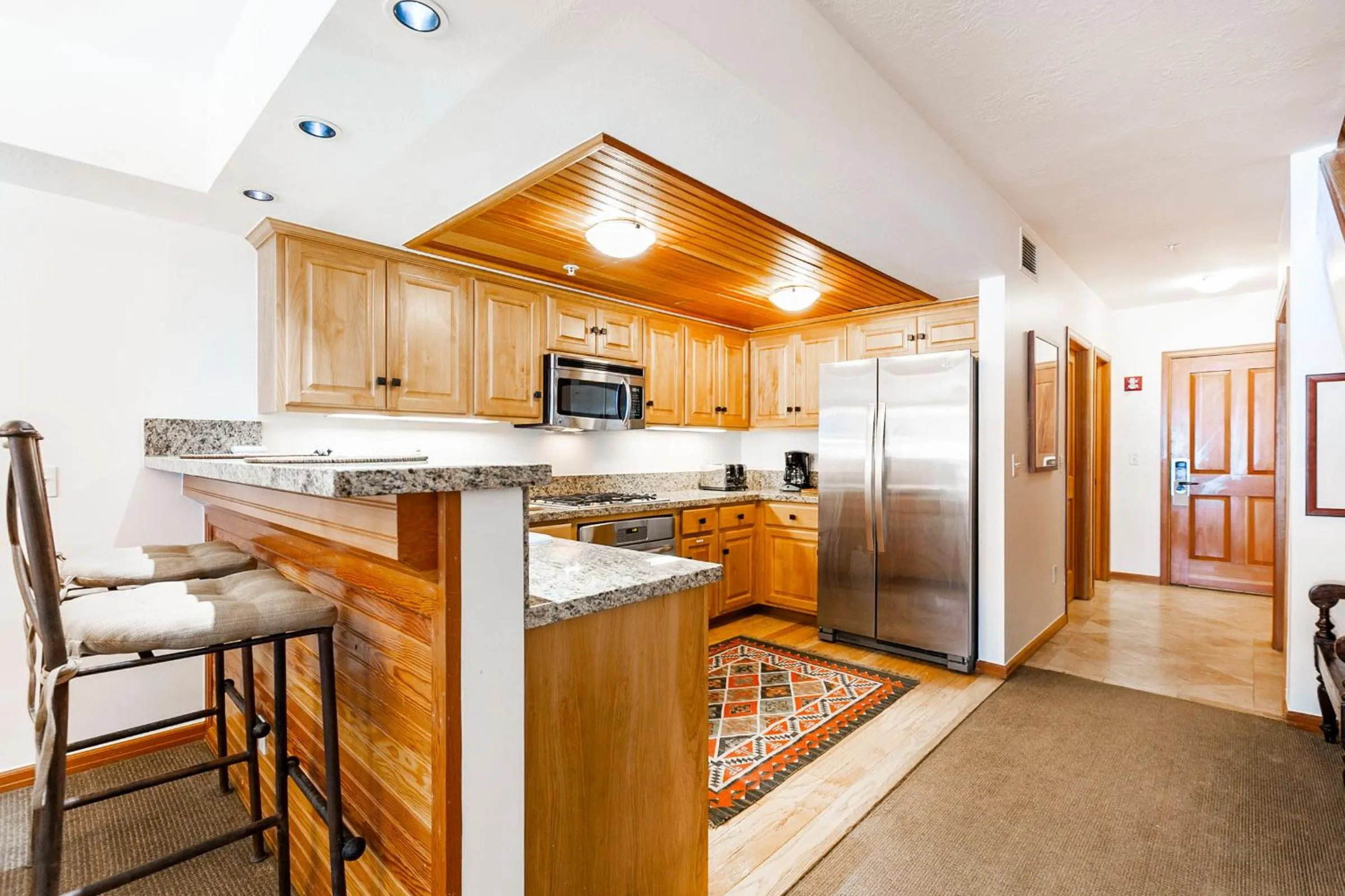 kitchen in The Caledonian by All Seasons Resort Lodging