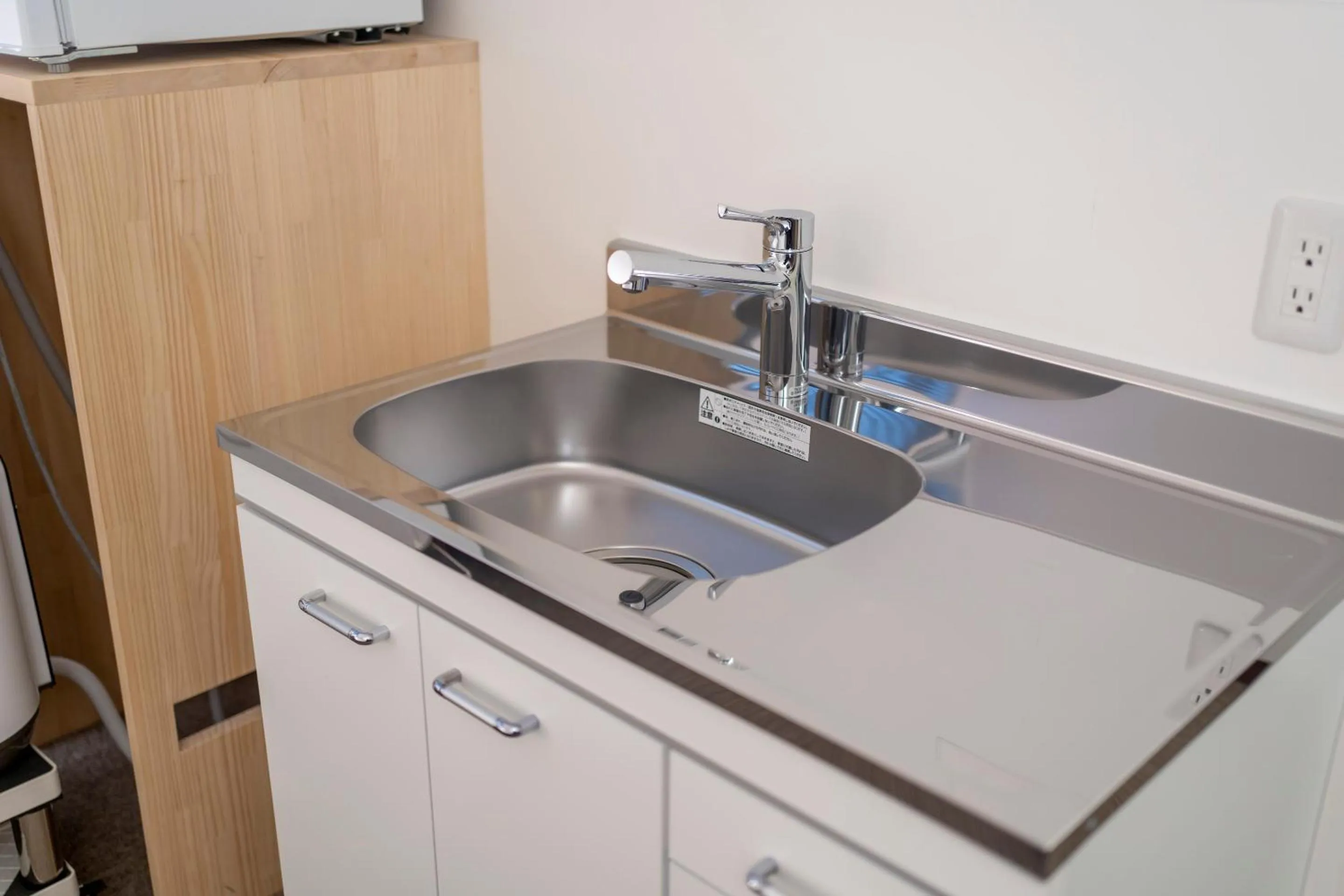 Kitchen or kitchenette in RESI STAY Jisco Hotel Kyoto Goshonishi