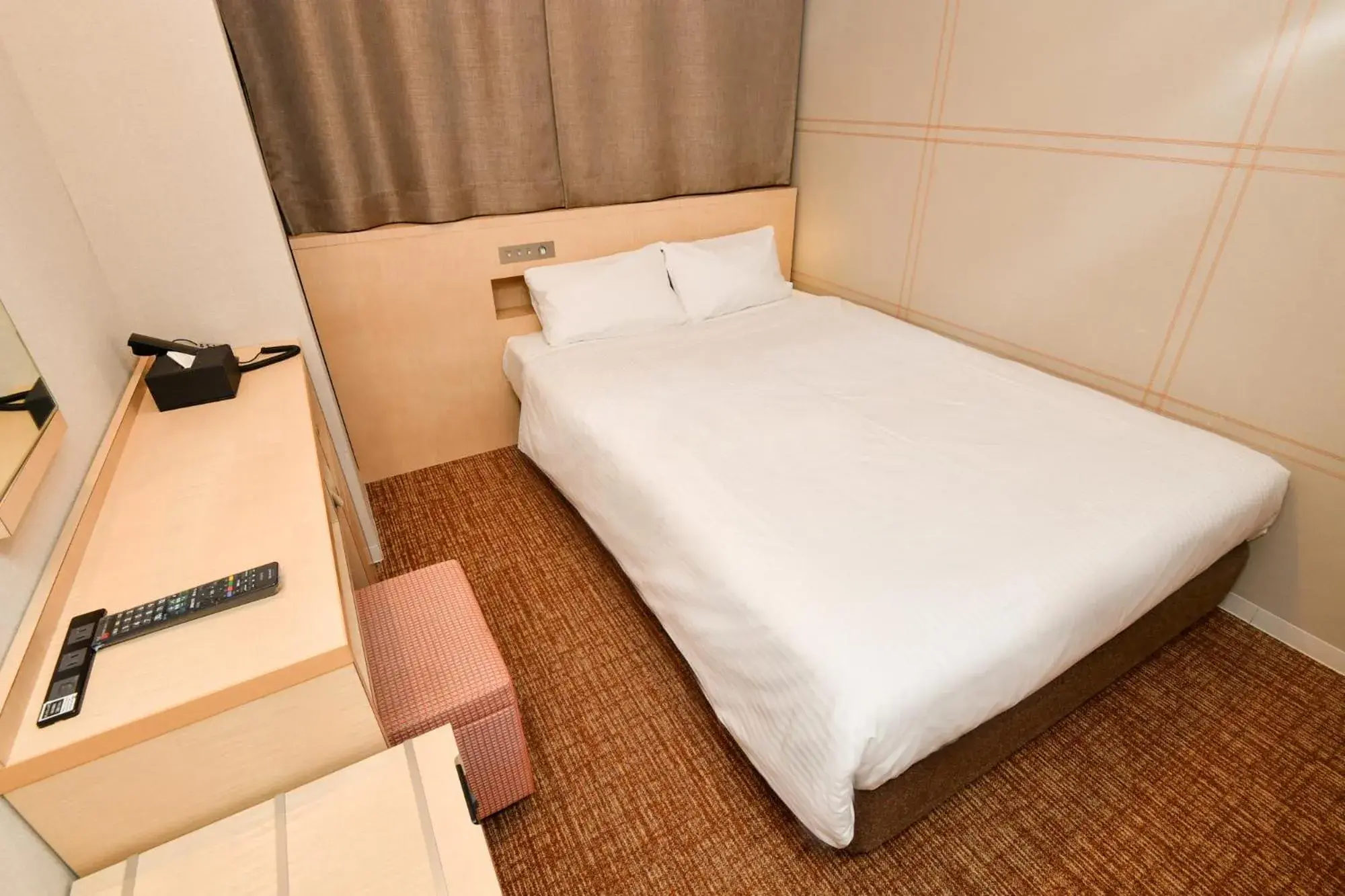Bed in Sanco Inn Nagoya Shinkansen-guchi Annex Bed in Sanco Inn Nagoya Shinkansen-guchi Annex