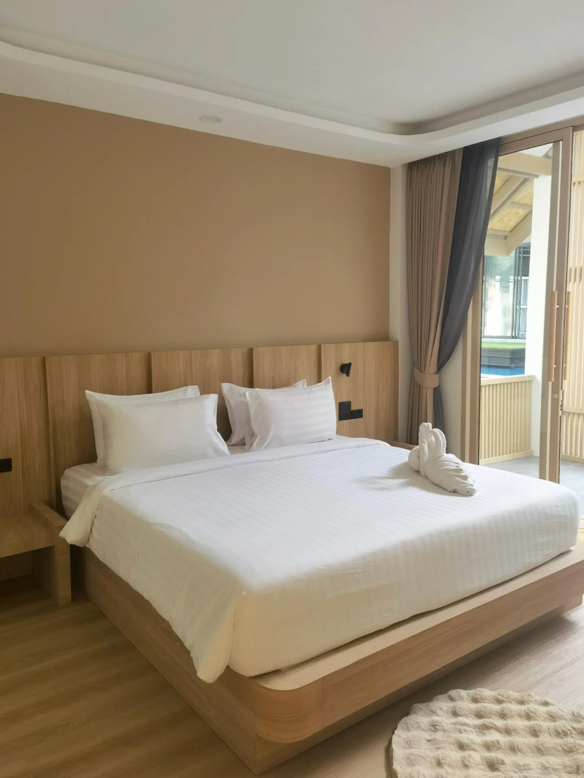 Bed in Phi Phi Andaman Legacy Resort Bed in Phi Phi Andaman Legacy Resort