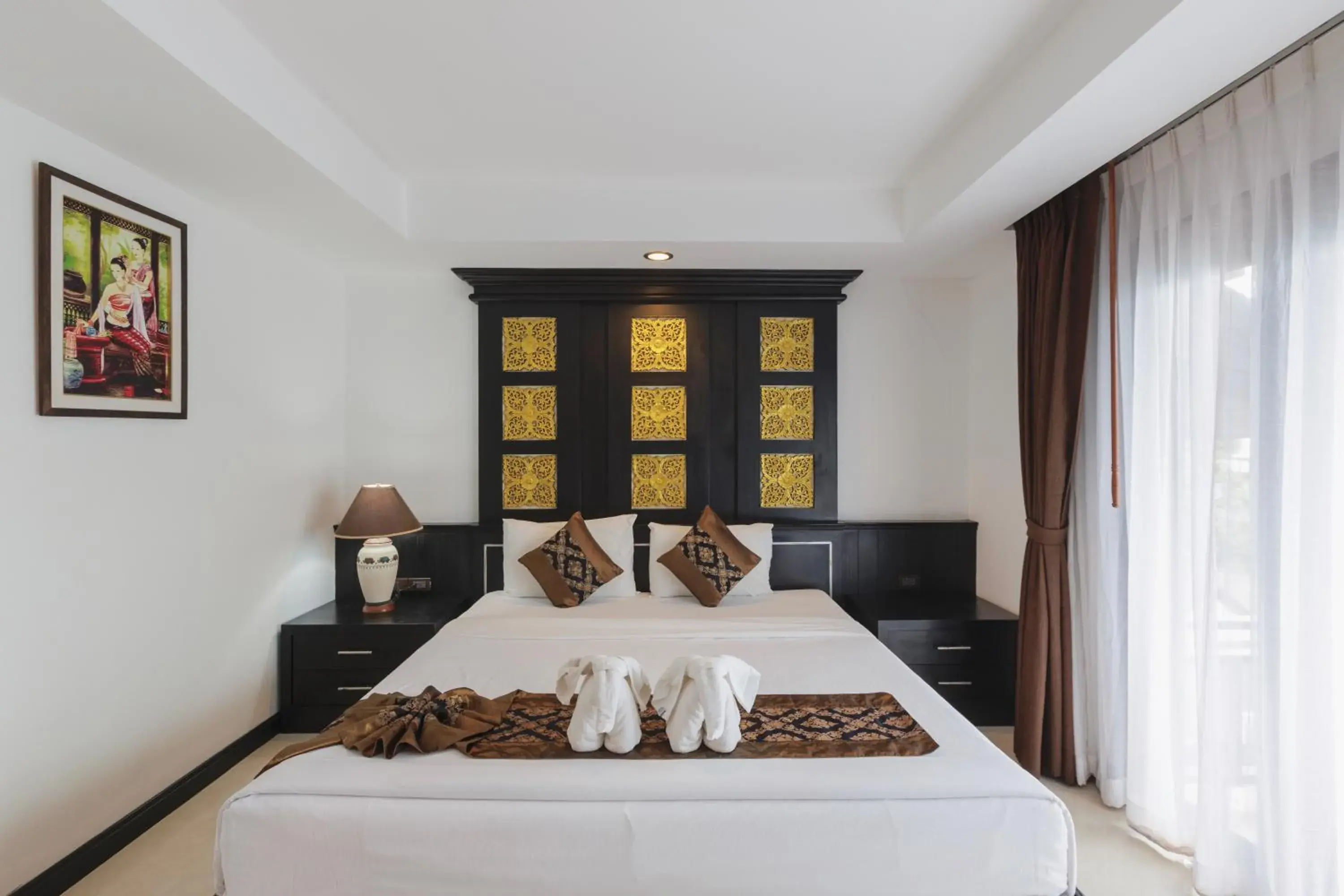 Bed in Phi Phi Andaman Legacy Resort Bed in Phi Phi Andaman Legacy Resort