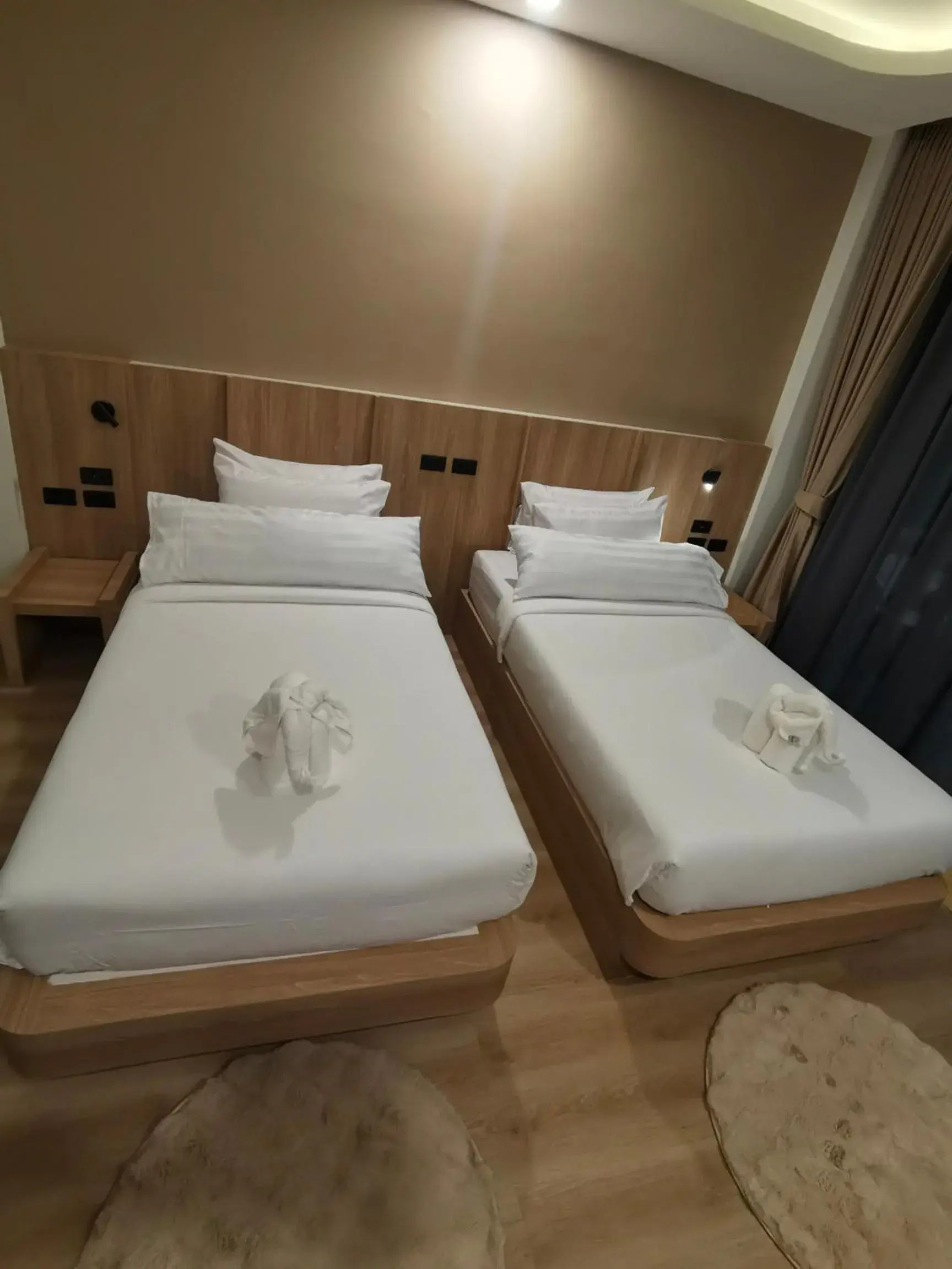 Bed in Phi Phi Andaman Legacy Resort Bed in Phi Phi Andaman Legacy Resort