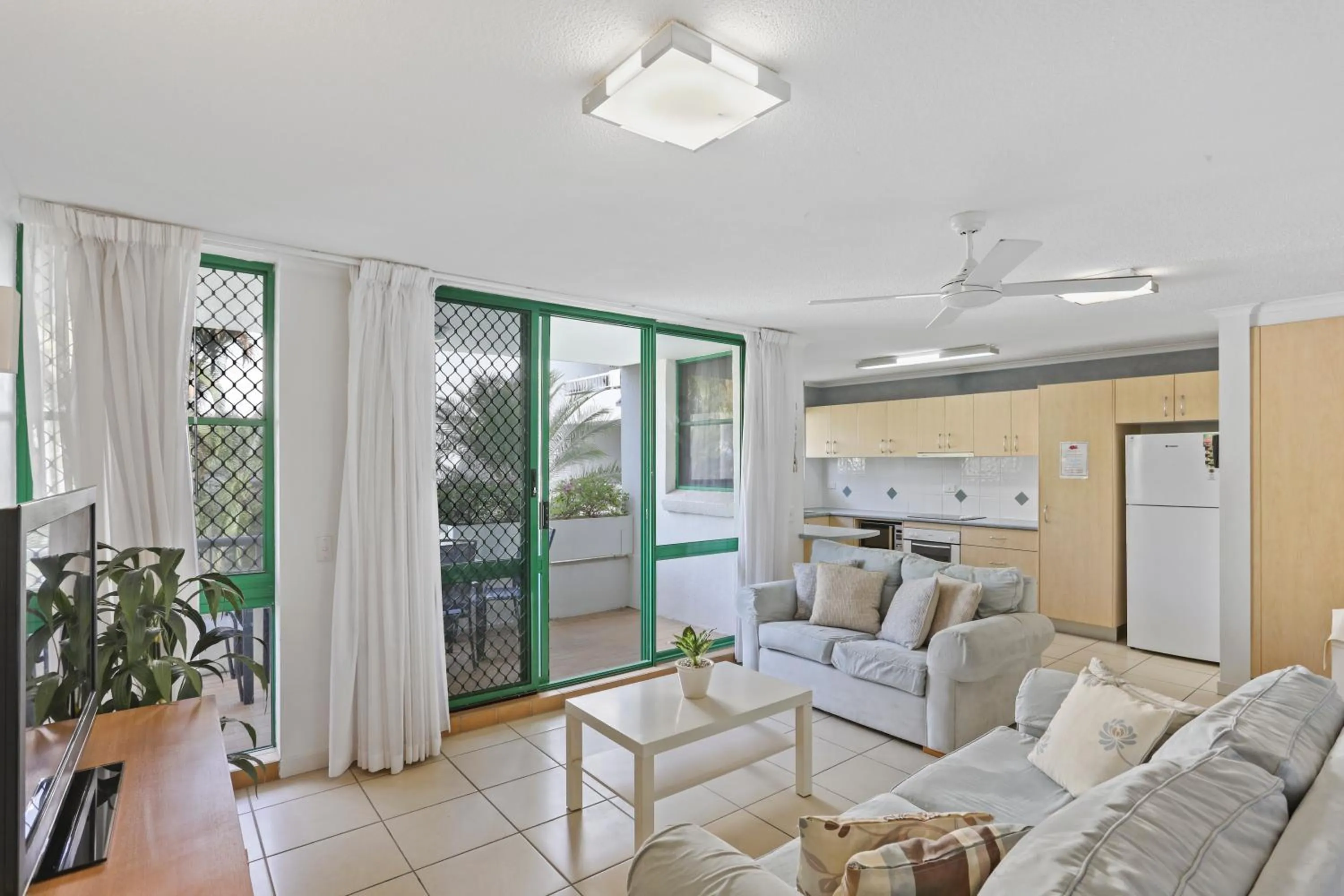 Living room in Headland Gardens Holiday Apartments