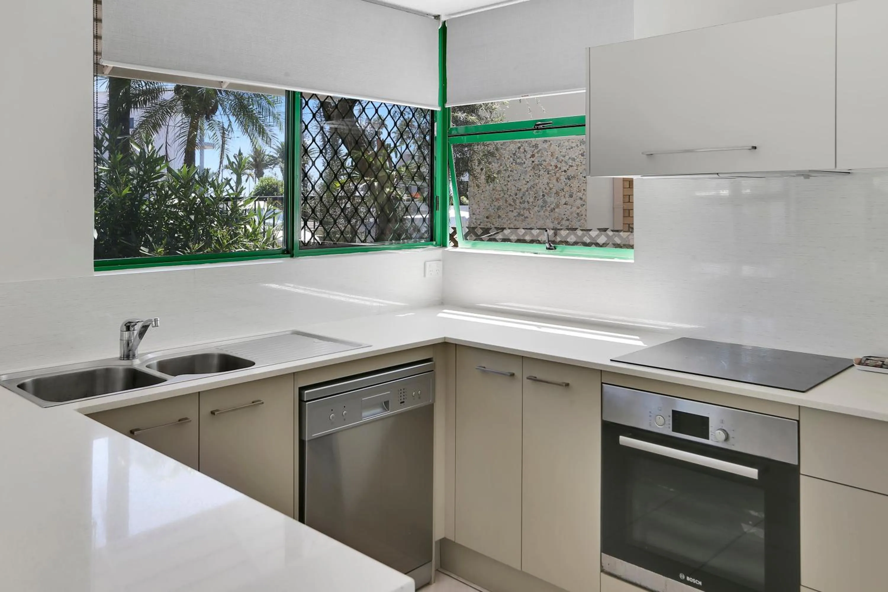 kitchen in Headland Gardens Holiday Apartments