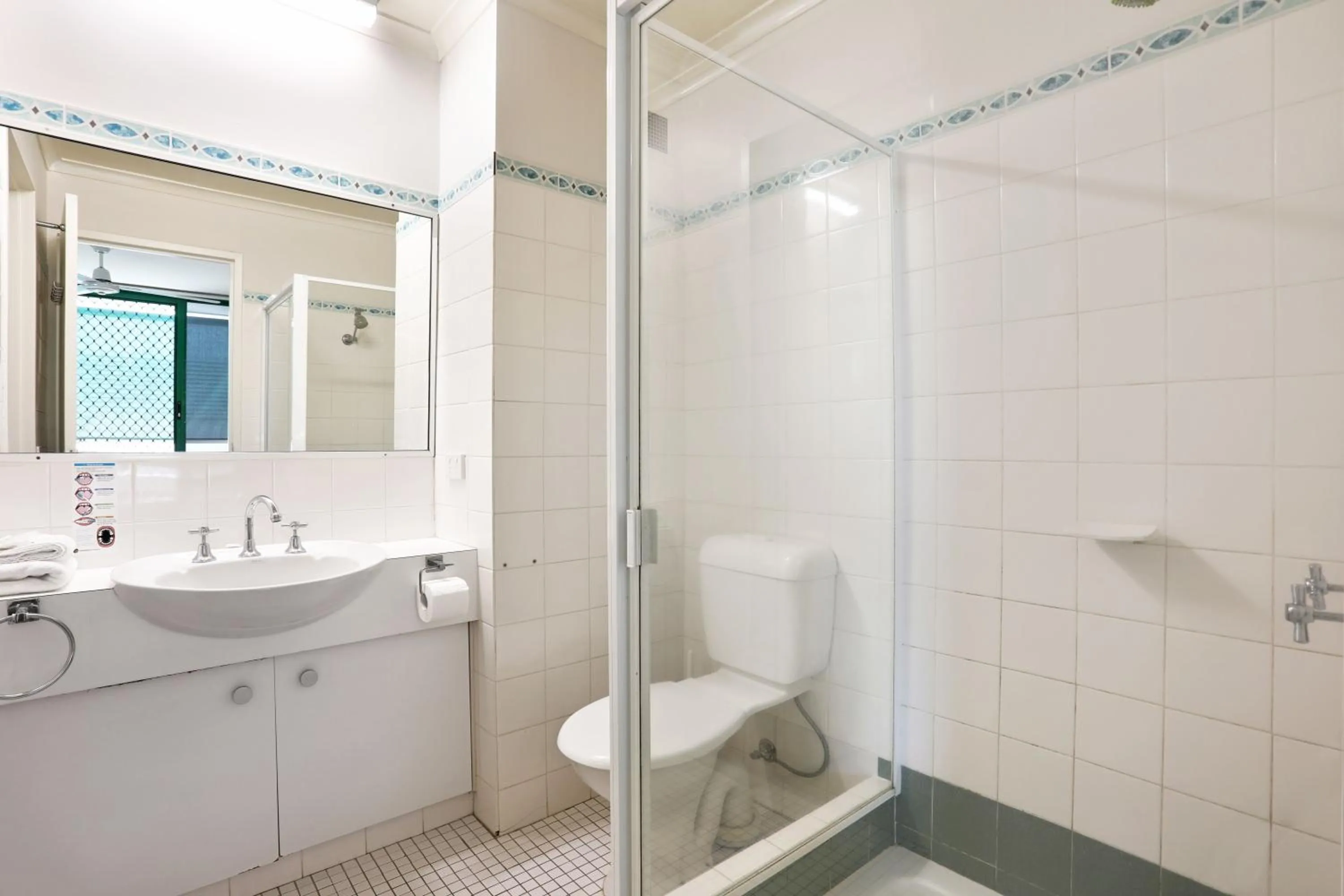 Bathroom in Headland Gardens Holiday Apartments