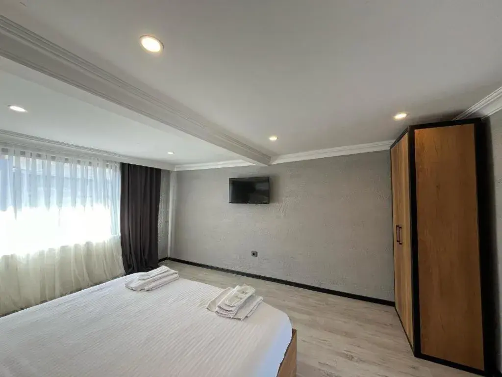 Bed in Le Safran Suite Hotel Bed in Le Safran Suite Hotel