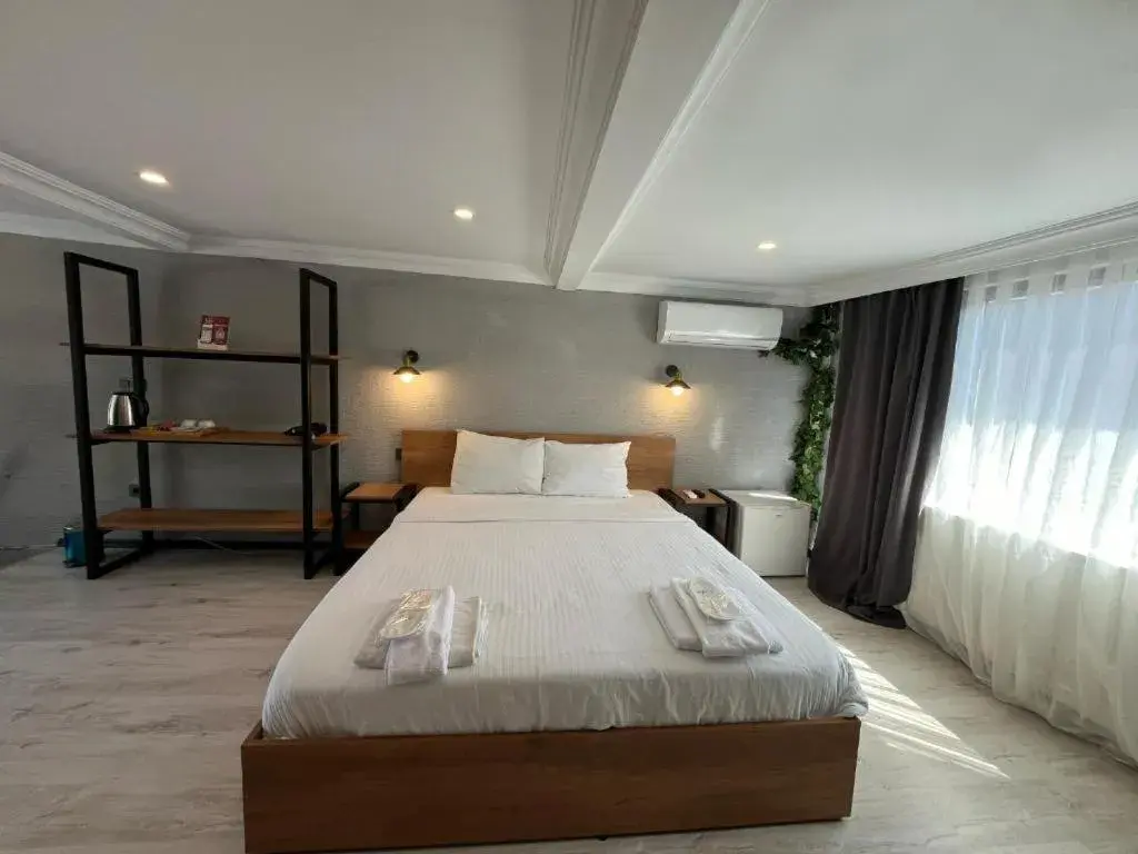 Bed in Le Safran Suite Hotel Bed in Le Safran Suite Hotel