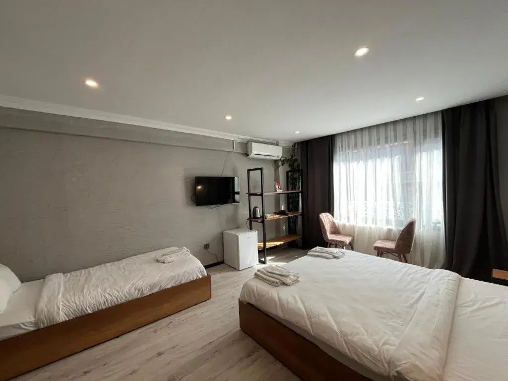 Bed in Le Safran Suite Hotel Bed in Le Safran Suite Hotel