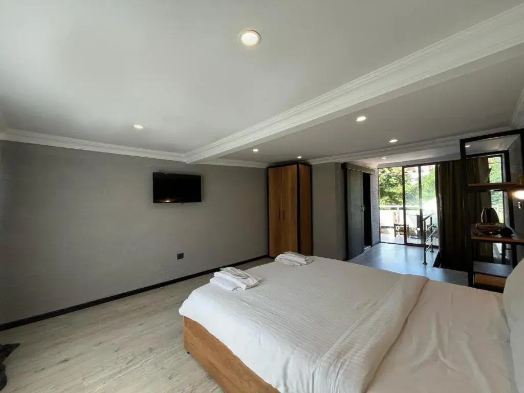 Bed in Le Safran Suite Hotel Bed in Le Safran Suite Hotel