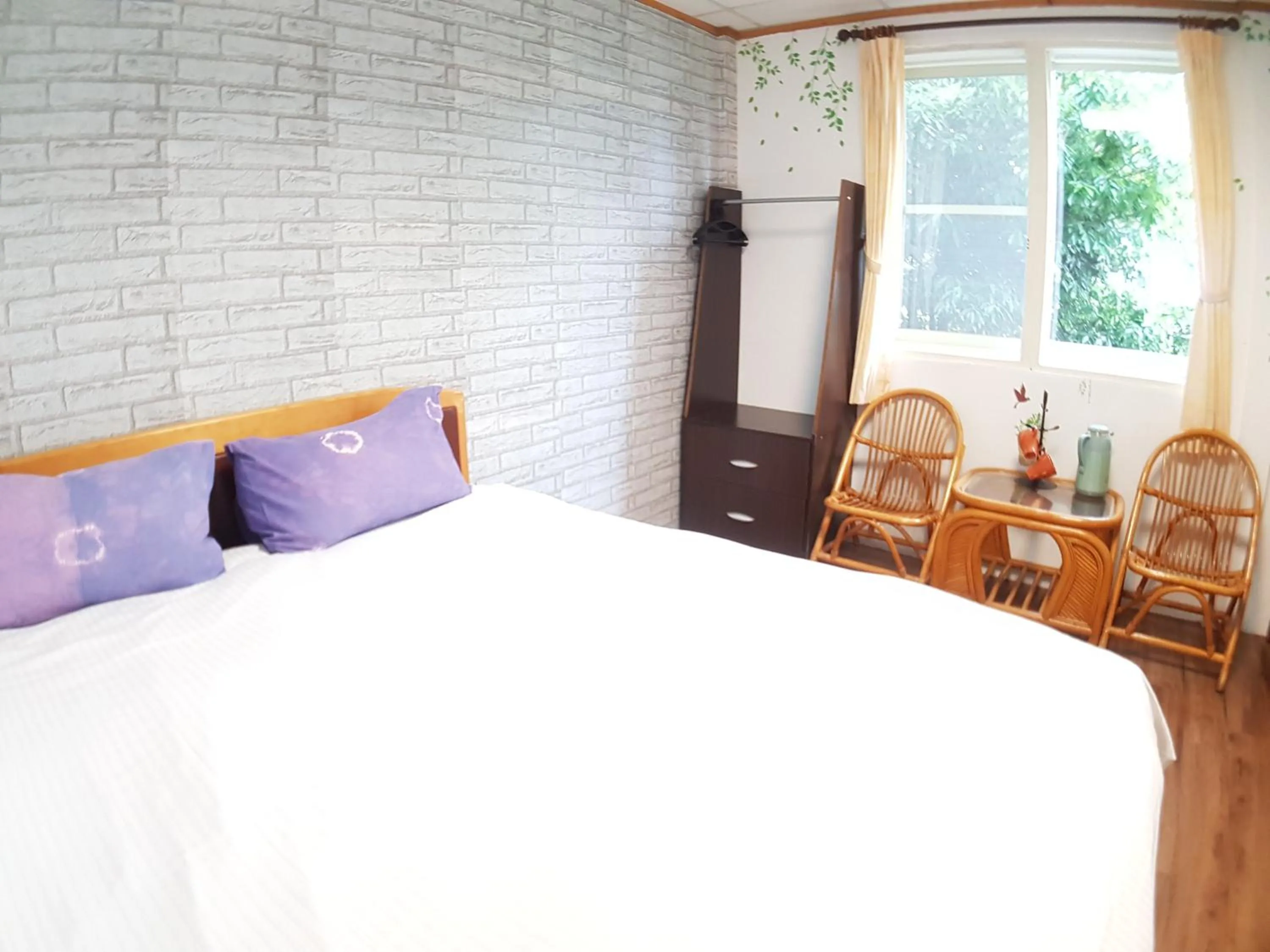 Bed in Shan Shui-Yuan Vege Guest House