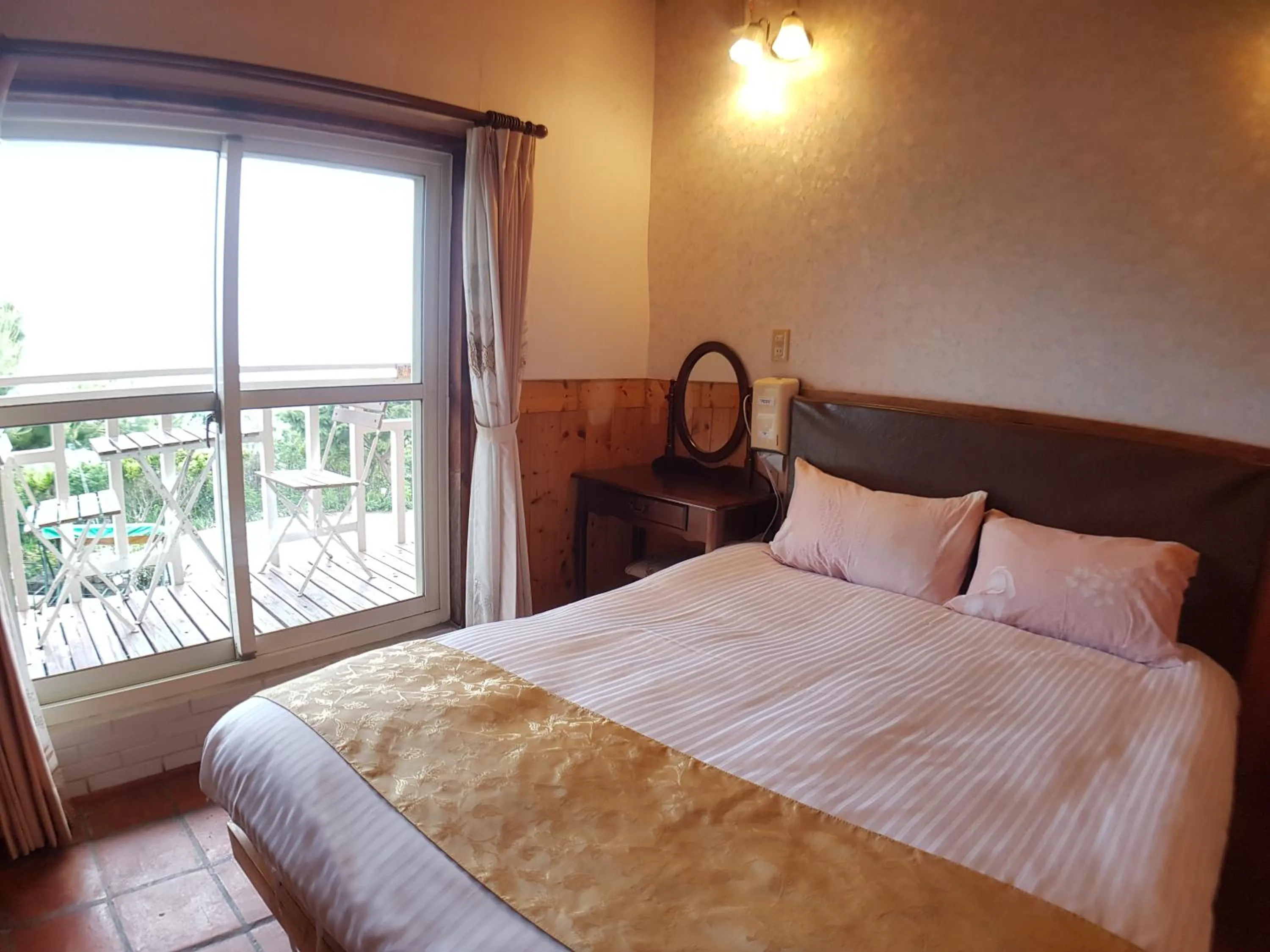 Bed in Shan Shui-Yuan Vege Guest House