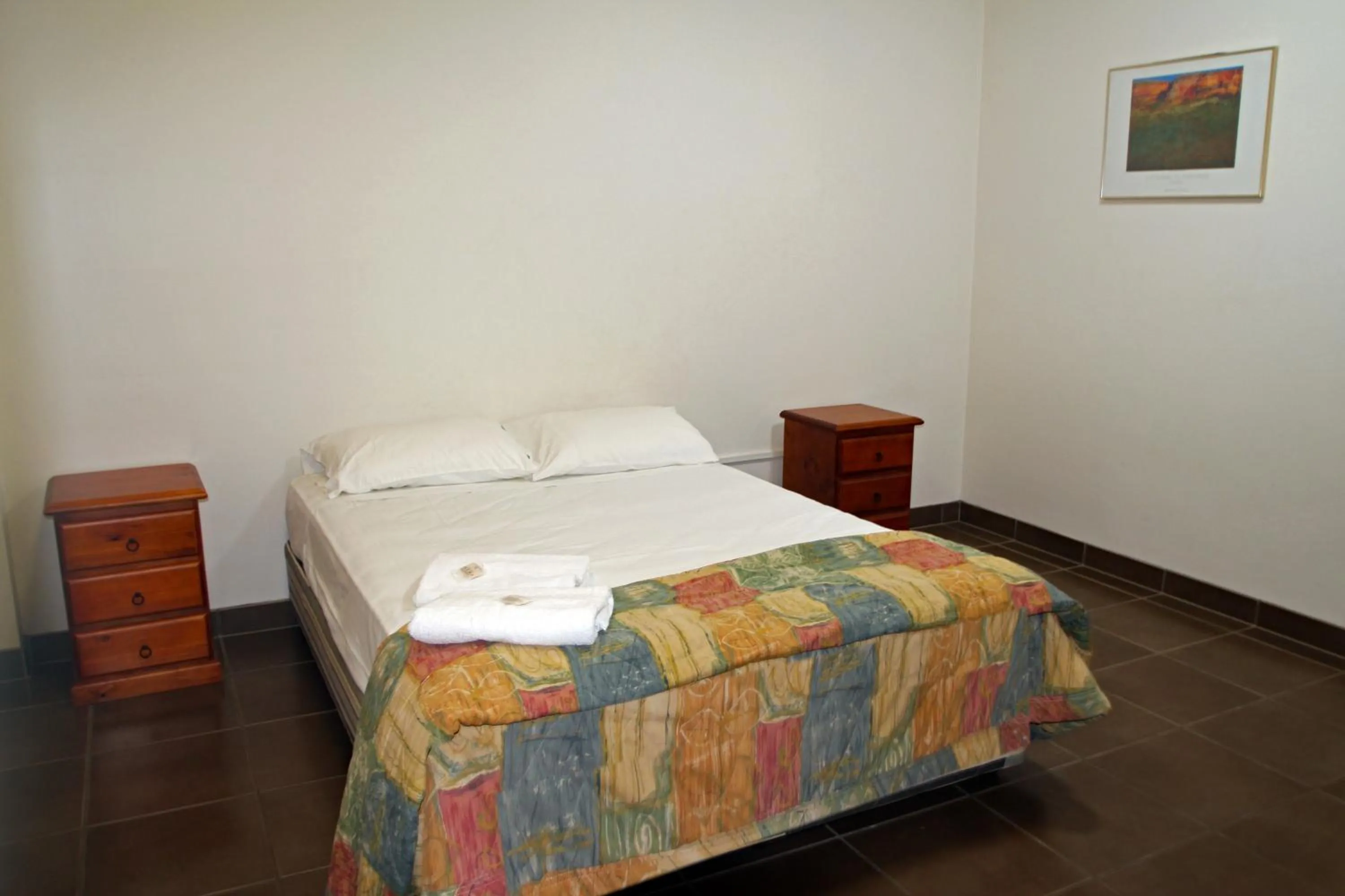 Bed in The Stuart Hotel-Motel