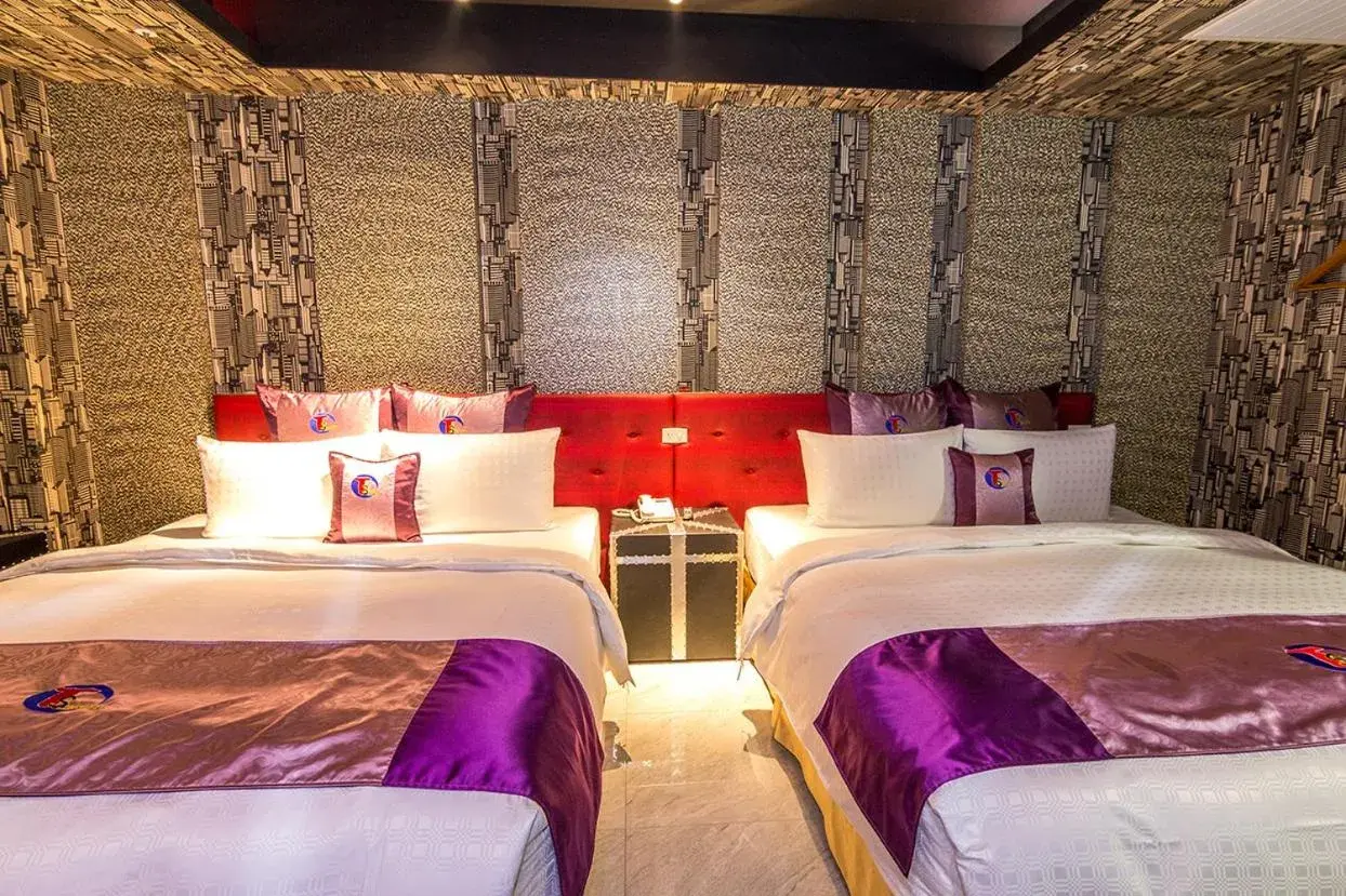 Bed in Ting-Shuai Motel Bed in Ting-Shuai Motel