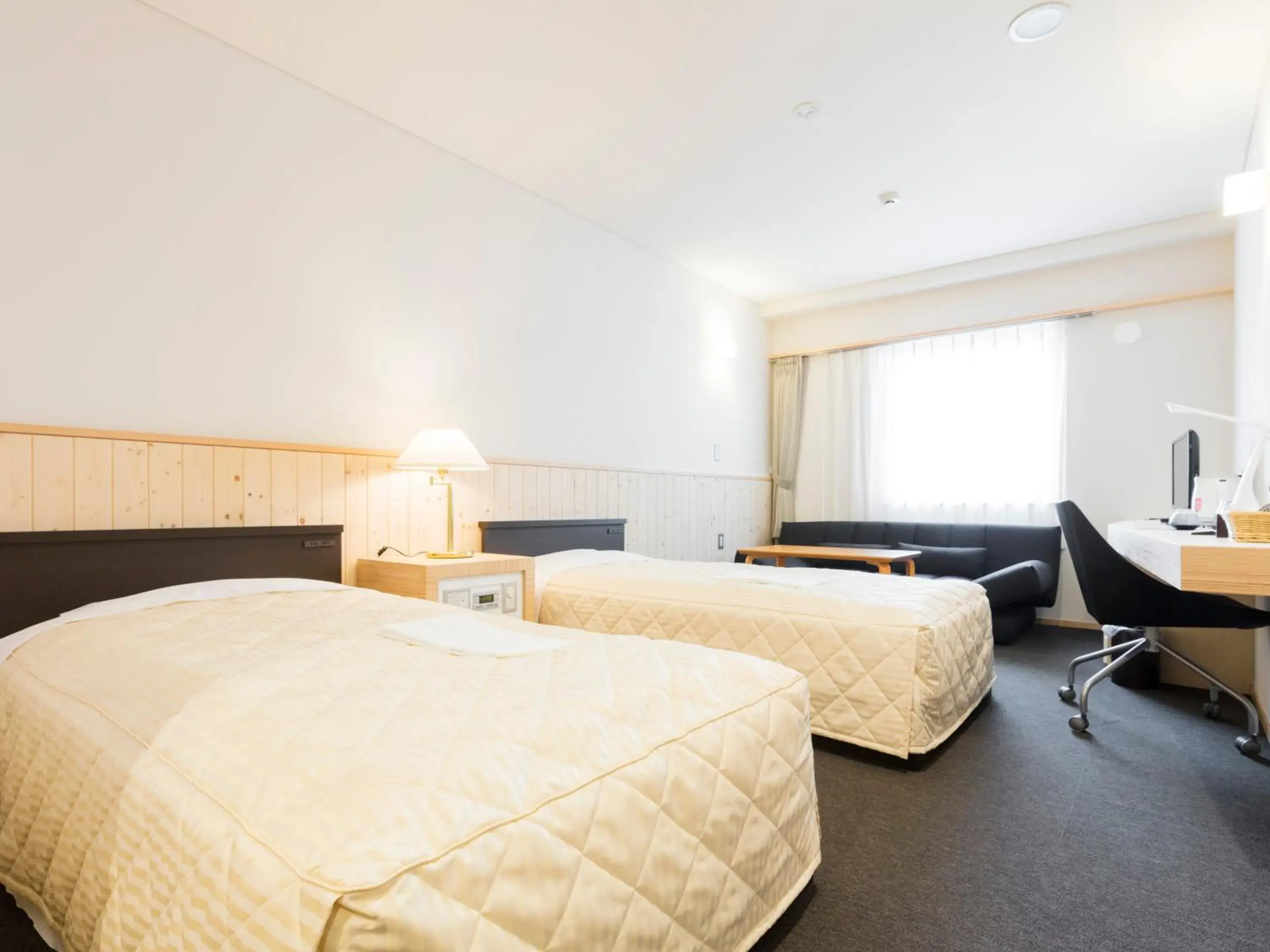 Standard Twin Room with Sofa - single occupancy in Hotel Higashimokoto Standard Twin Room with Sofa - single occupancy in Hotel Higashimokoto