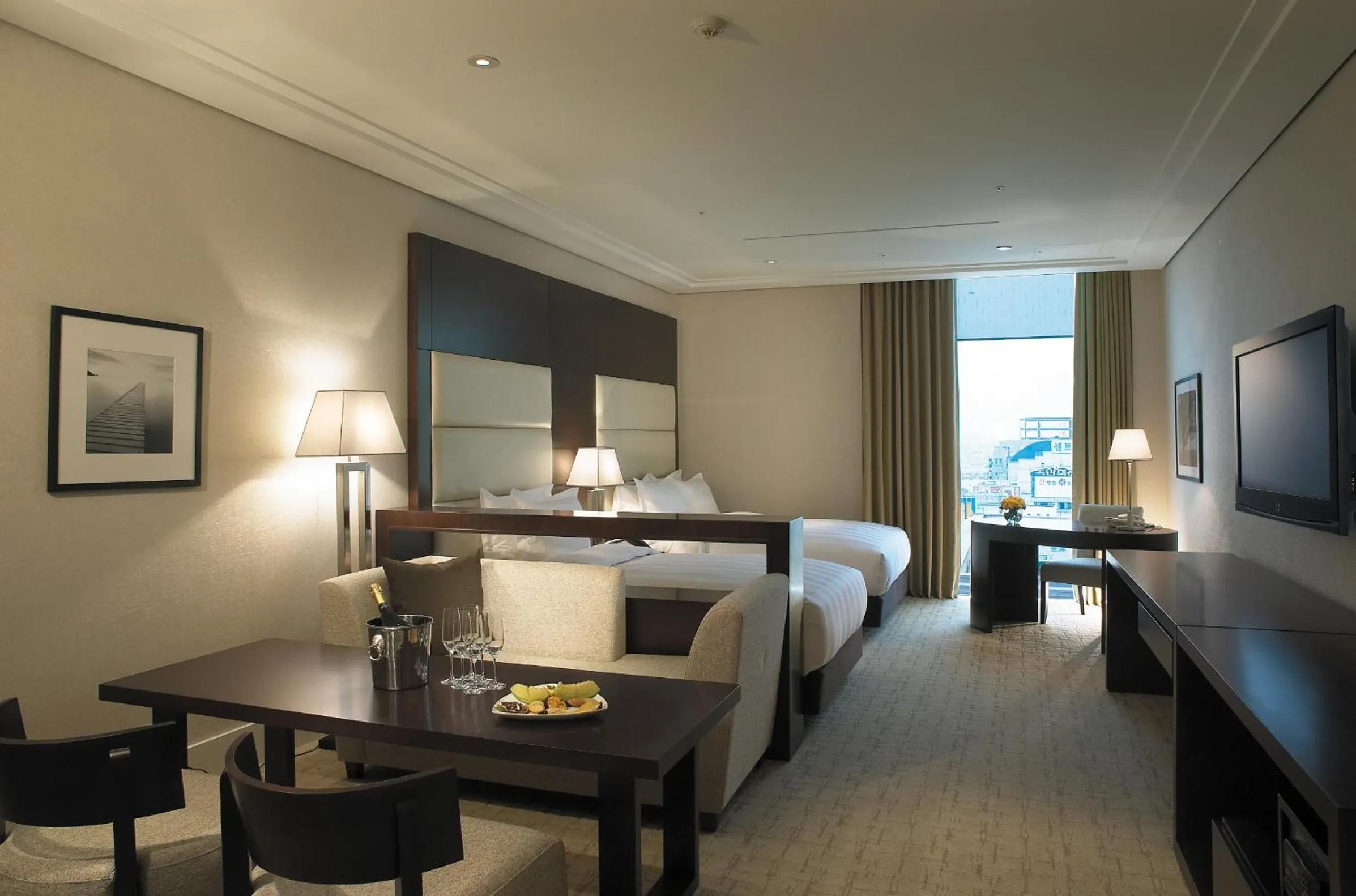 Photo of the whole room, Bed in Ramada Plaza by Wyndham Gwangju