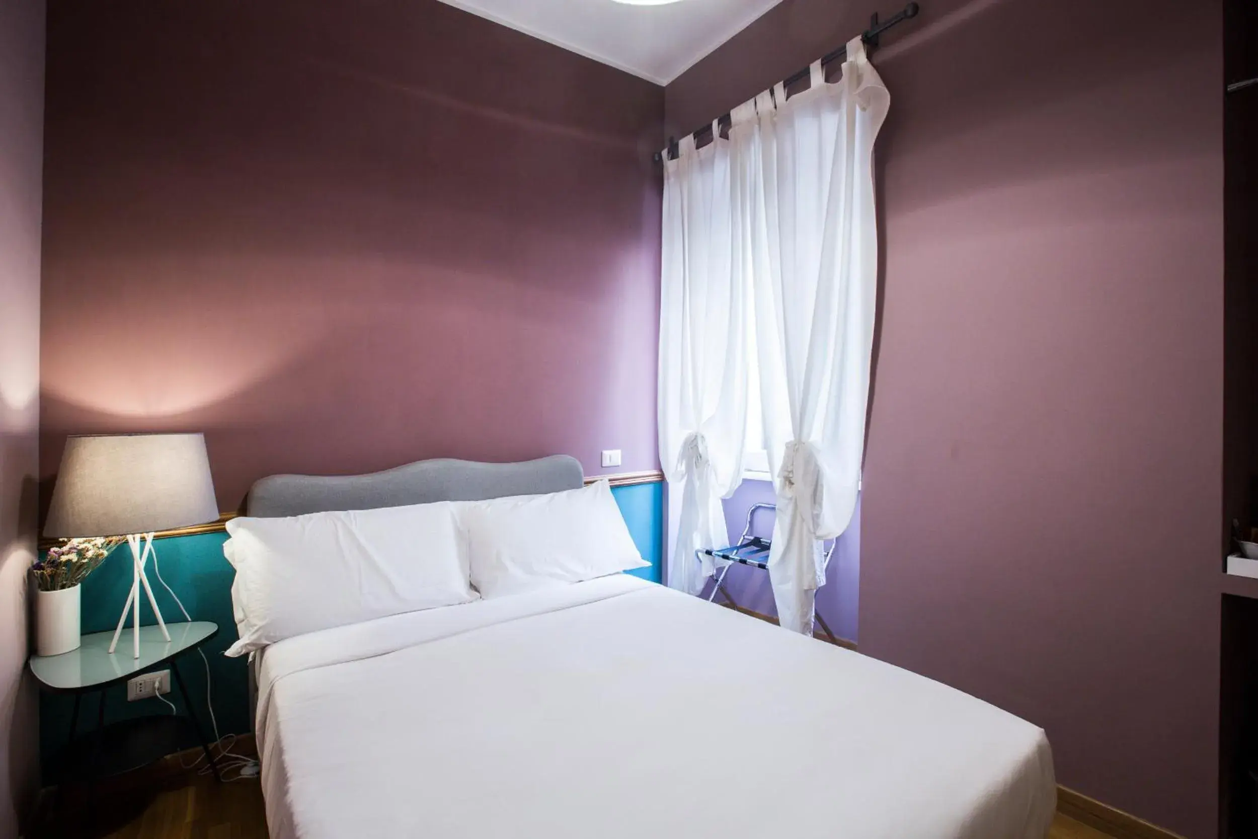 Bed in DEM Hotel Bed in DEM Hotel