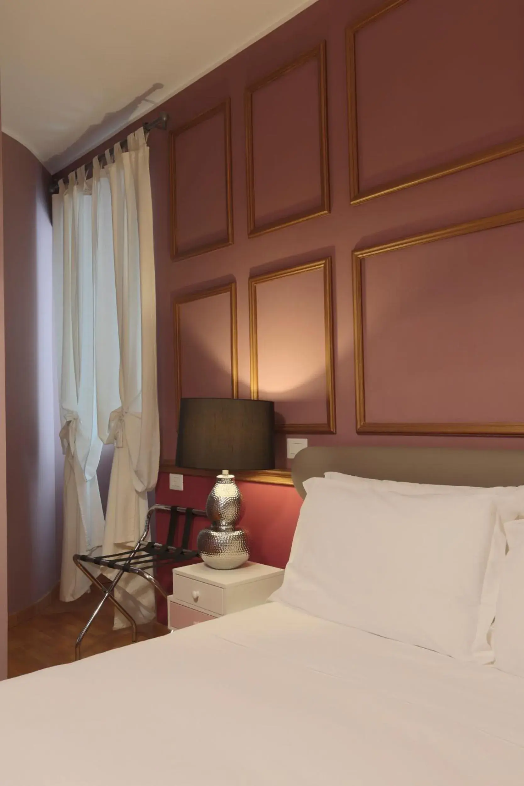 Bed in DEM Hotel Bed in DEM Hotel