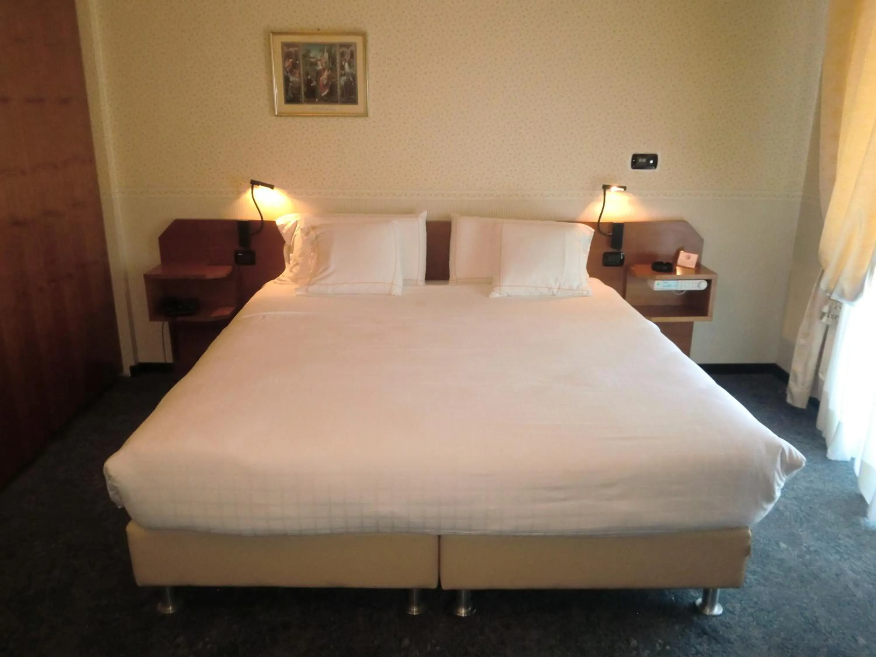 Bed in Hotel Ariston