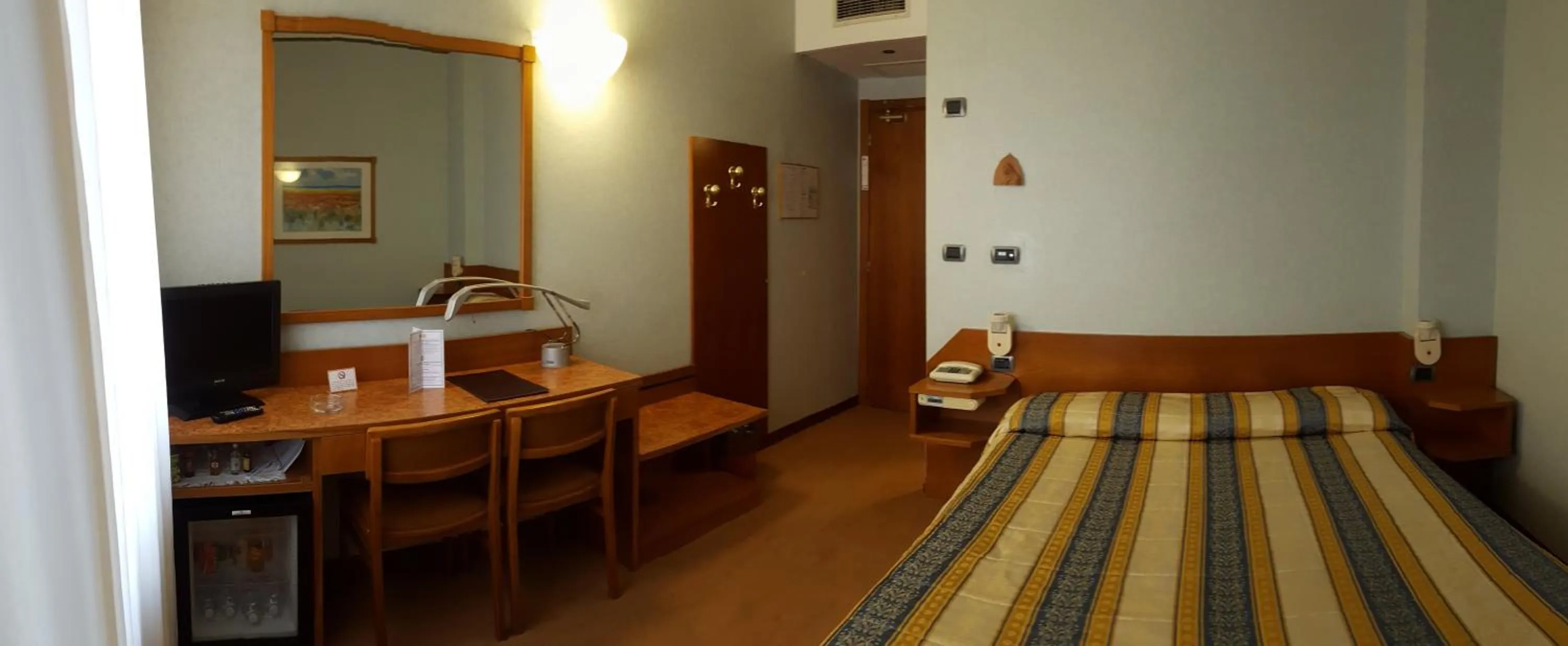 Bed in Hotel Ariston