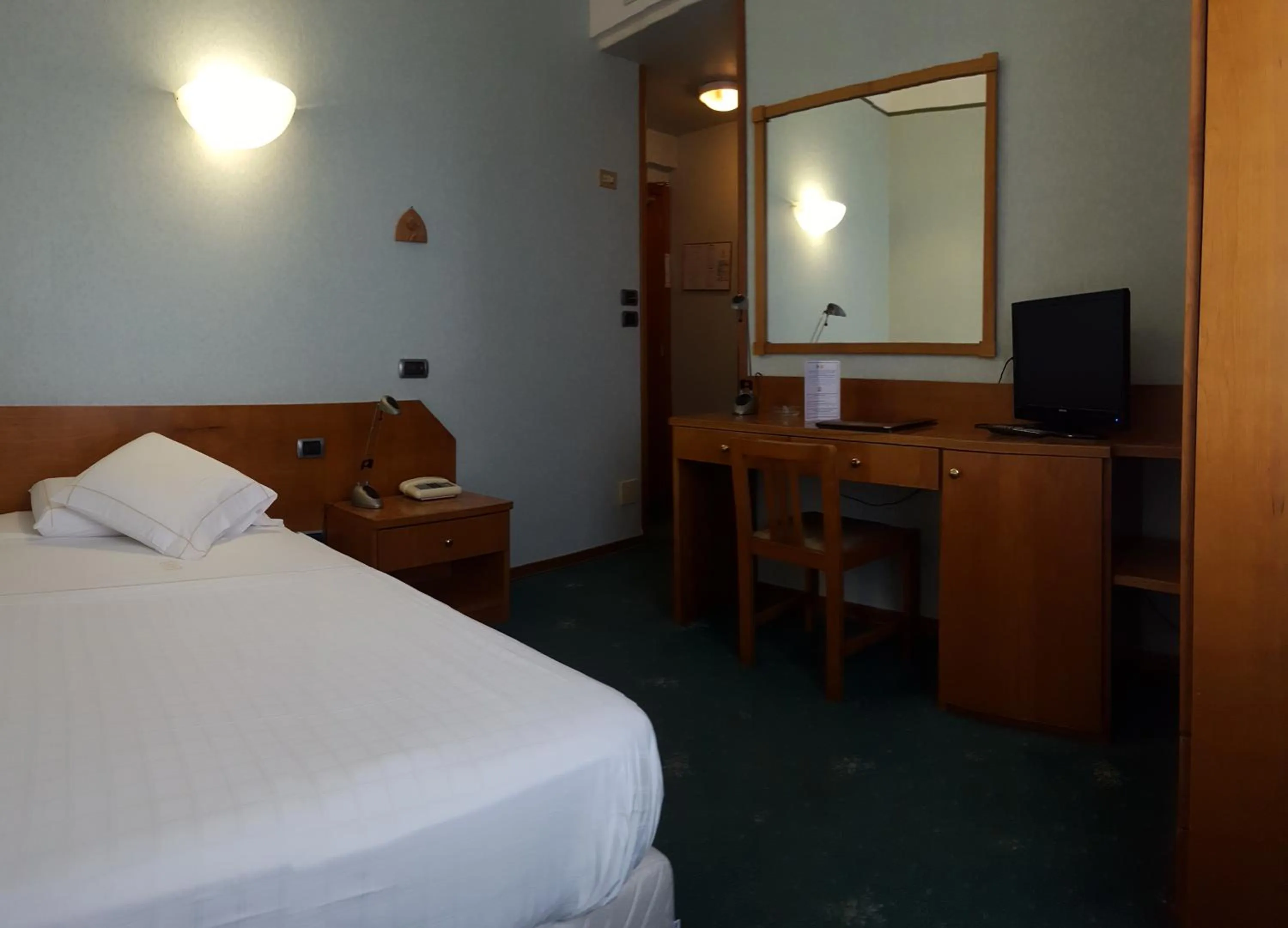 Bed in Hotel Ariston