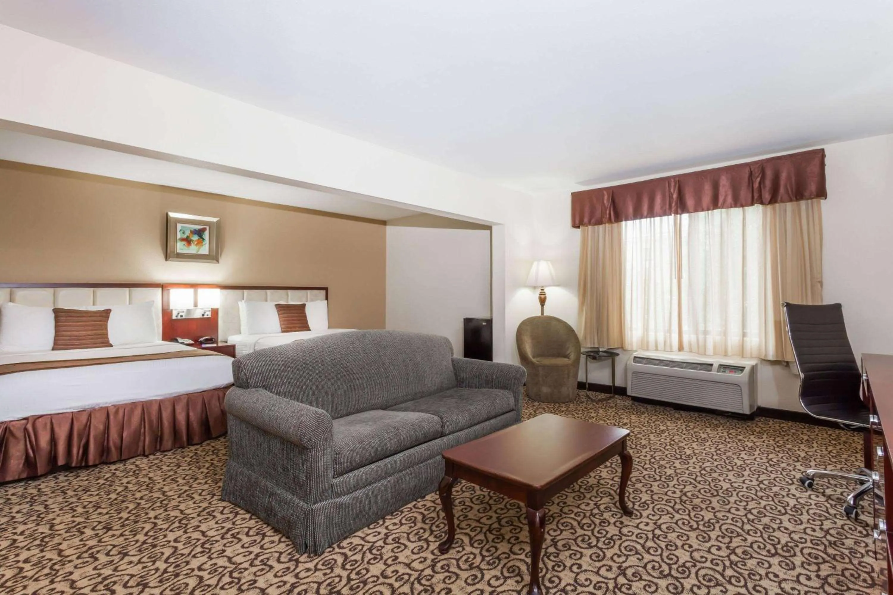 Photo of the whole room, Bed in Baymont by Wyndham Columbia Fort Jackson