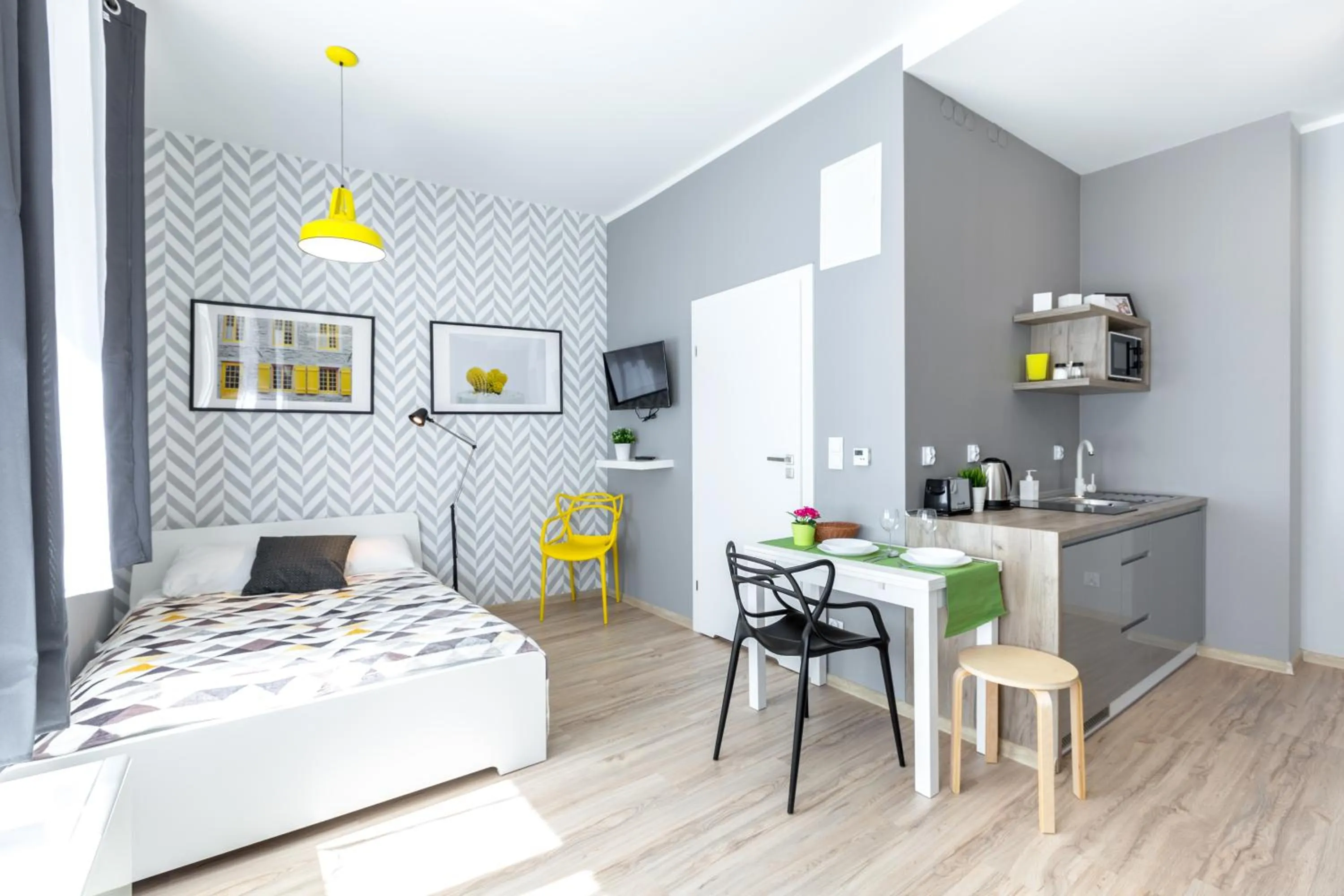 Seating area, Bed in Friendhouse Apartments Avenue