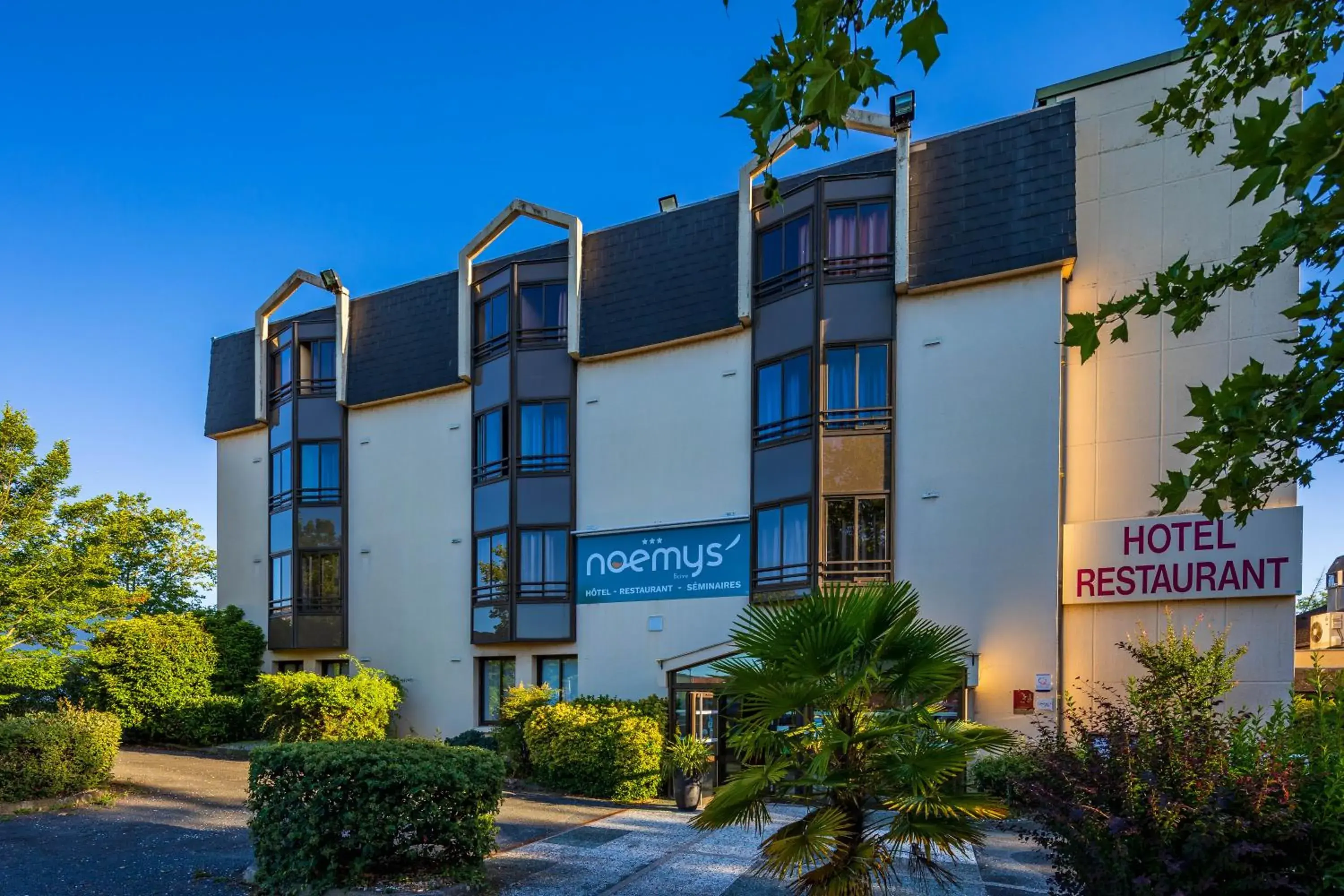 Property building in Logis Hotel Noemys Brive - Restaurant Le Teinchurier Property building in Logis Hotel Noemys Brive - Restaurant Le Teinchurier