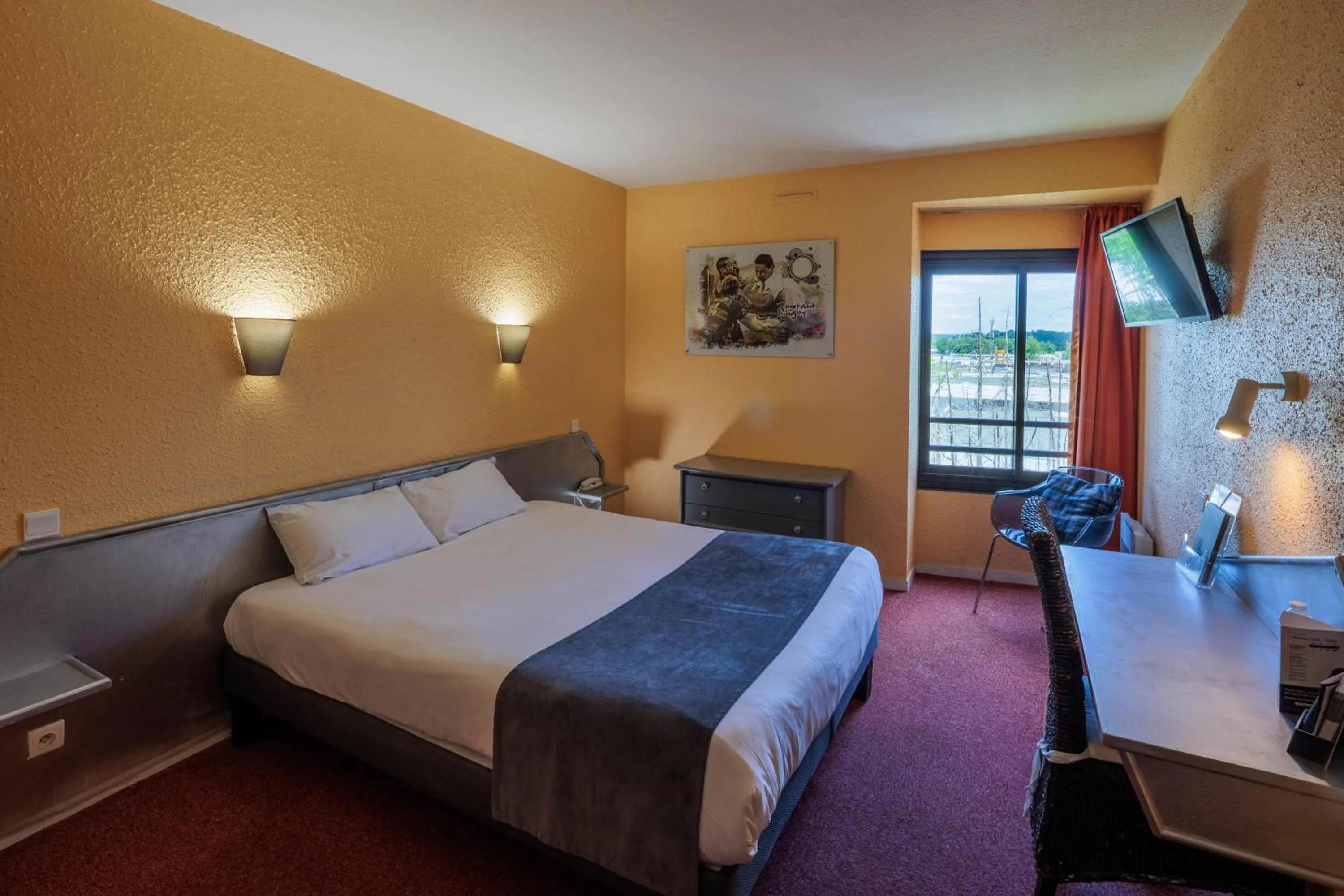 Bed in Logis Hotel Noemys Brive - Restaurant Le Teinchurier