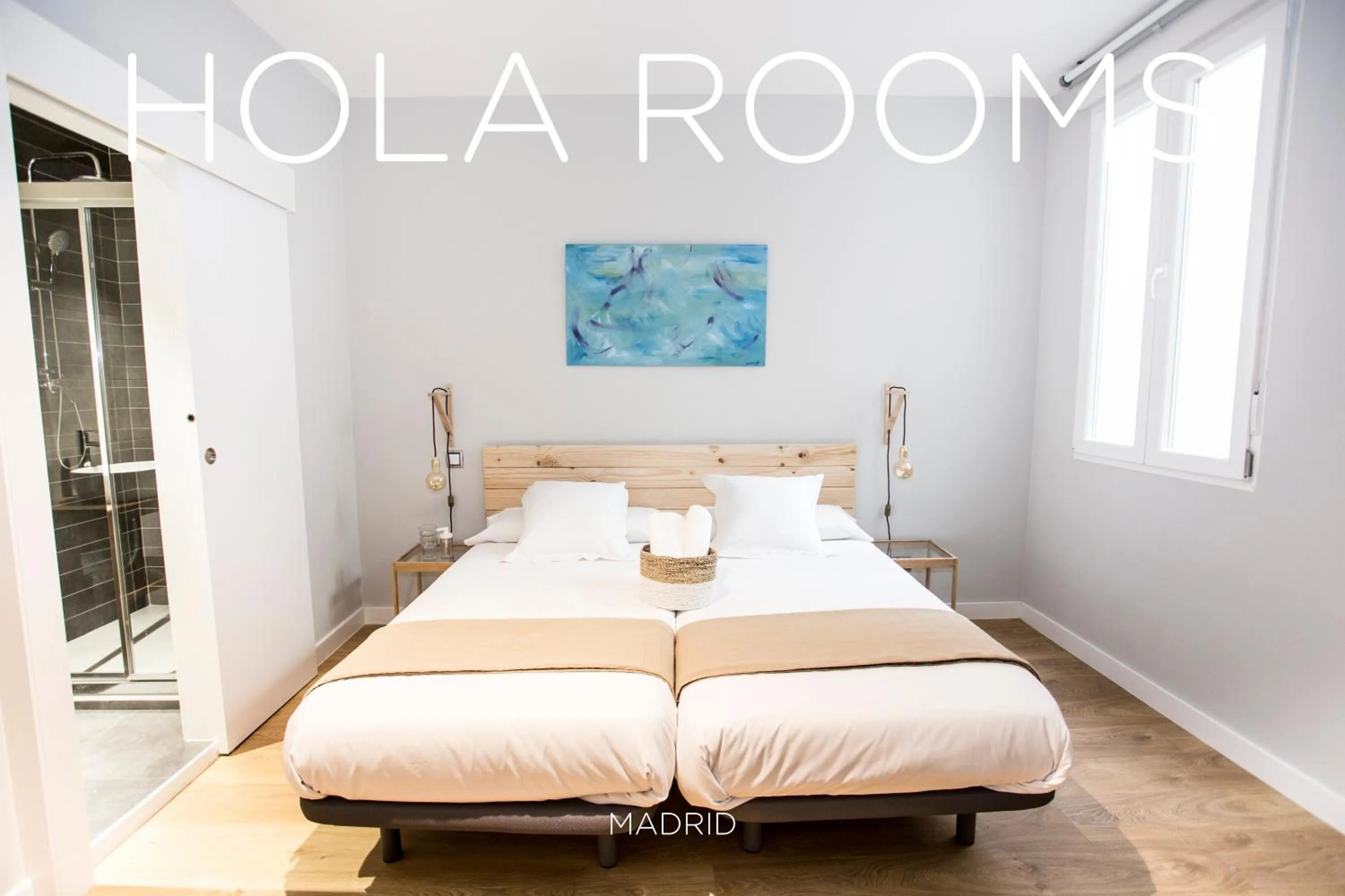 Bed in Hola Rooms