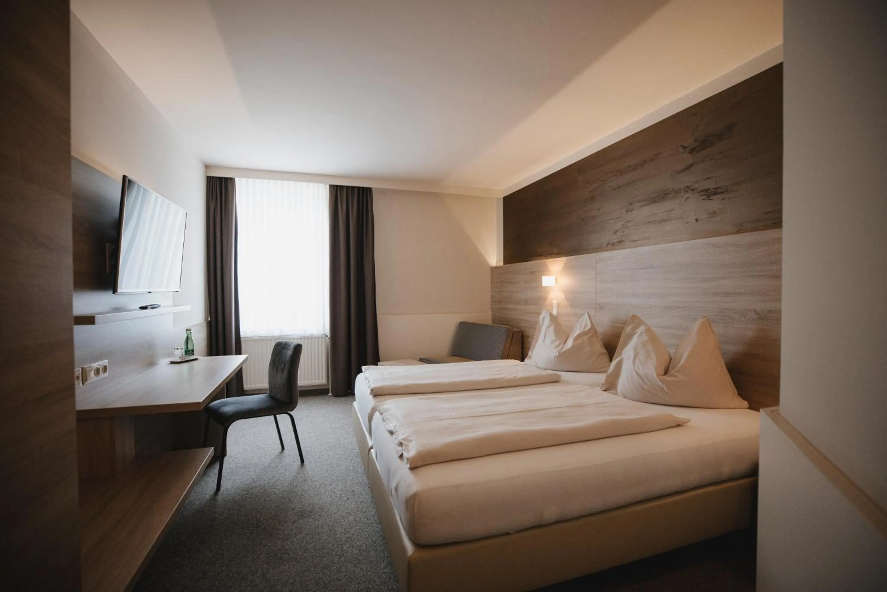 Photo of the whole room, Bed in Sporthotel Kapfenberg