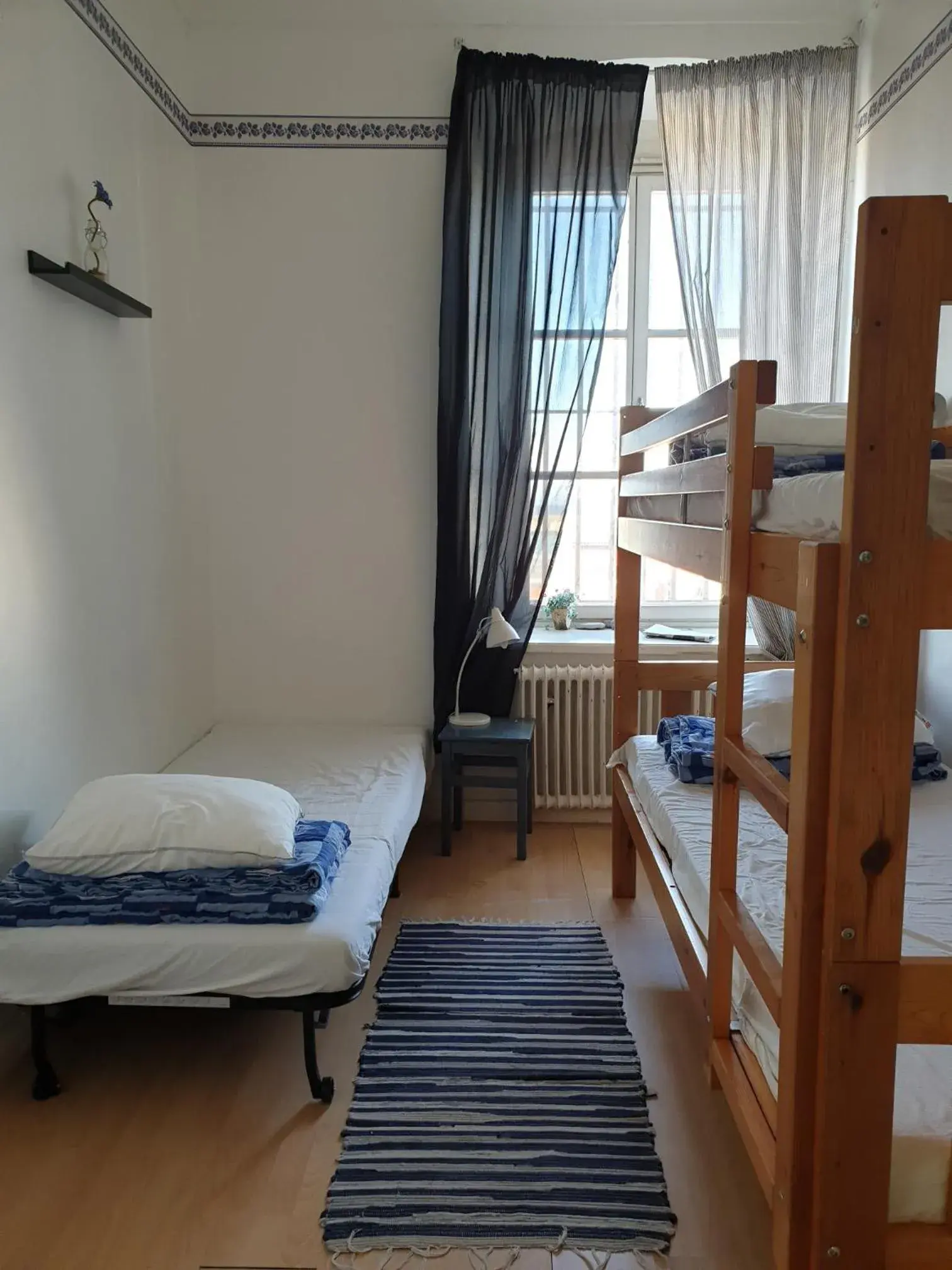 Basic Triple Room with Shared Bathroom in Visby Fängelse Basic Triple Room with Shared Bathroom in Visby Fängelse