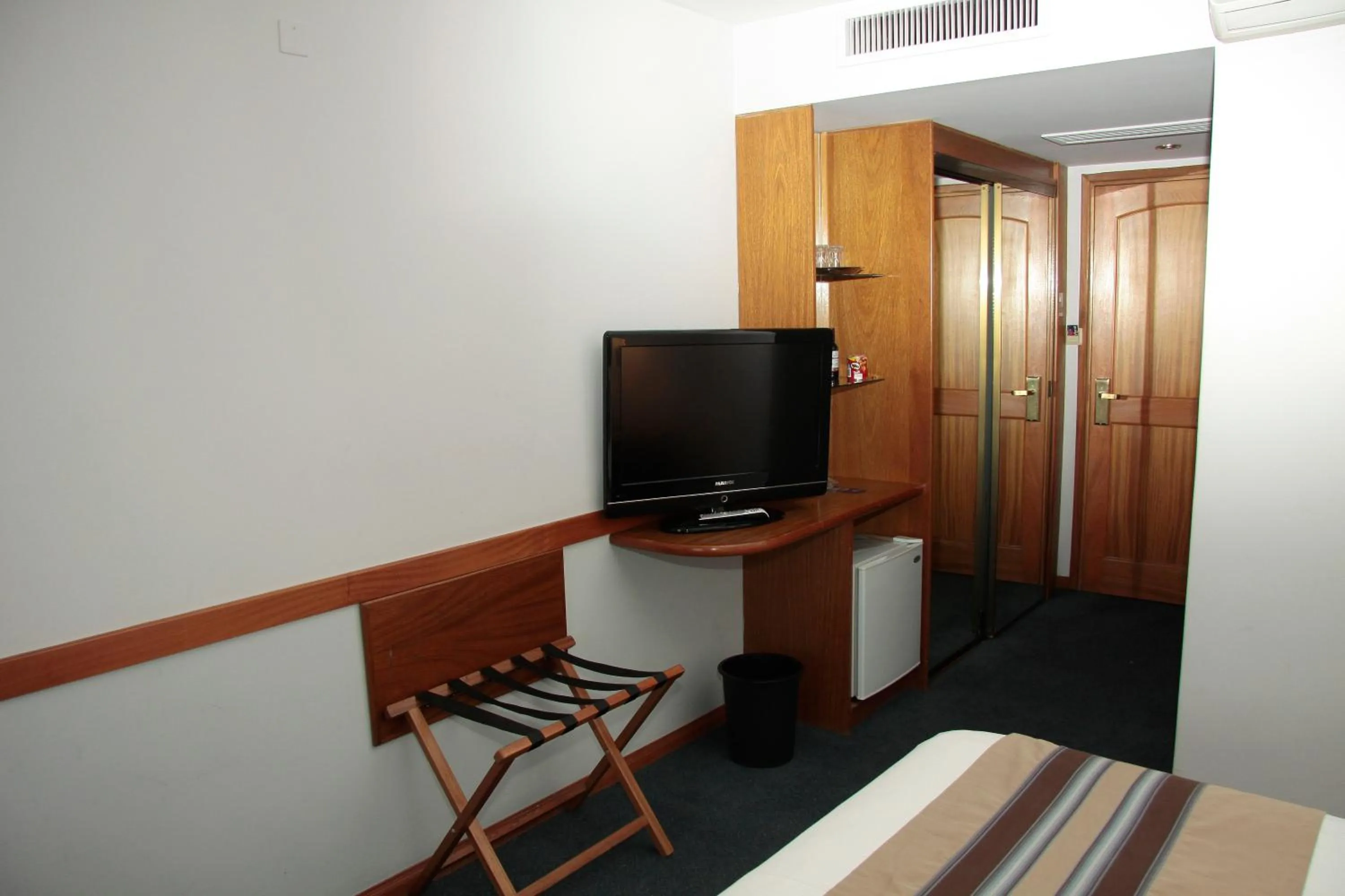 Bedroom in Crystal Palace Hotel