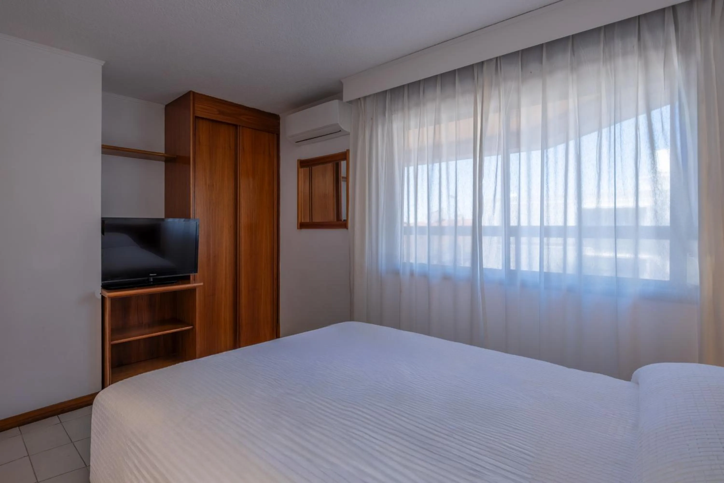 Bed in Golden Beach Resort & Spa