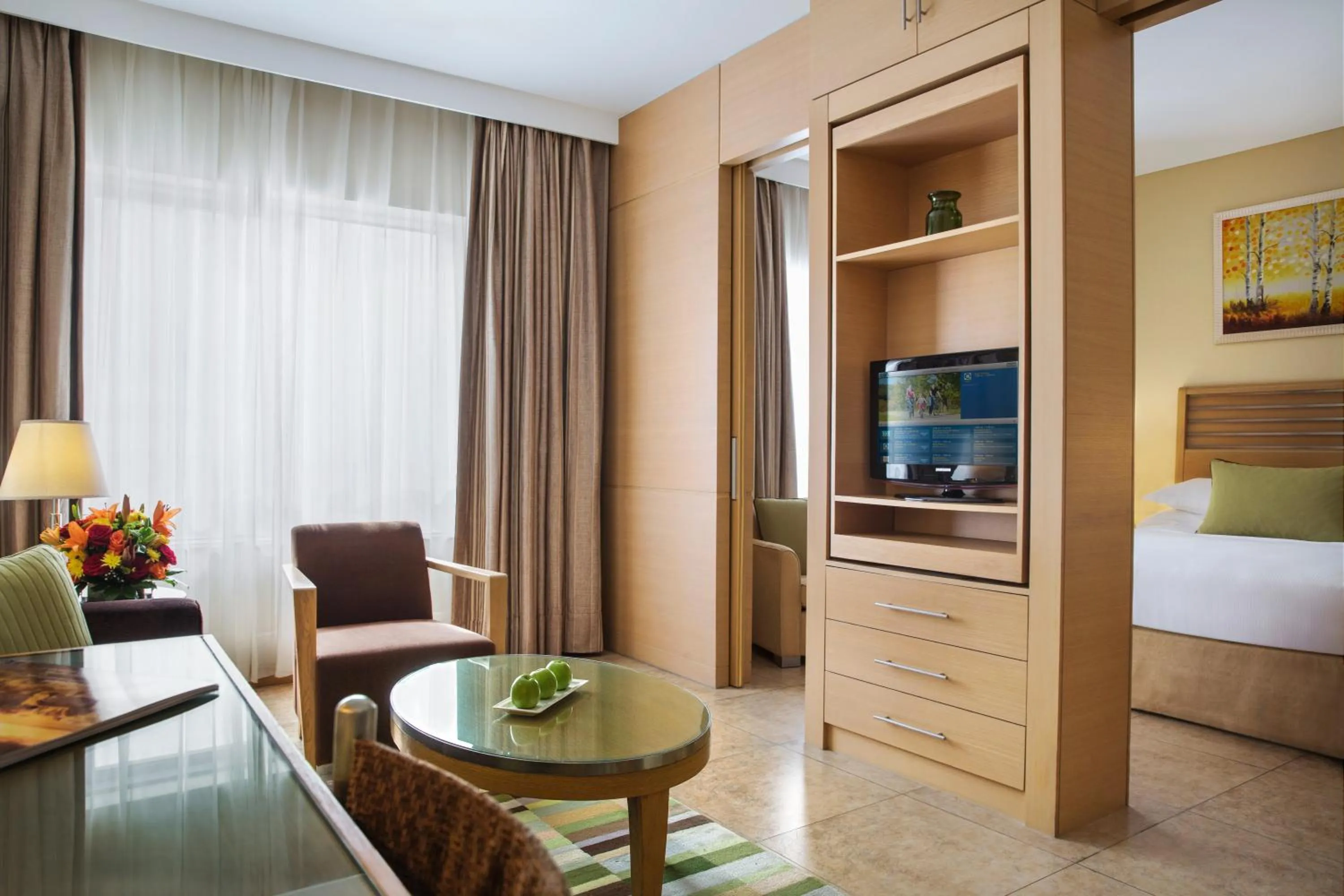 Living room, Bed in Nour Arjaan by Rotana-Fujairah
