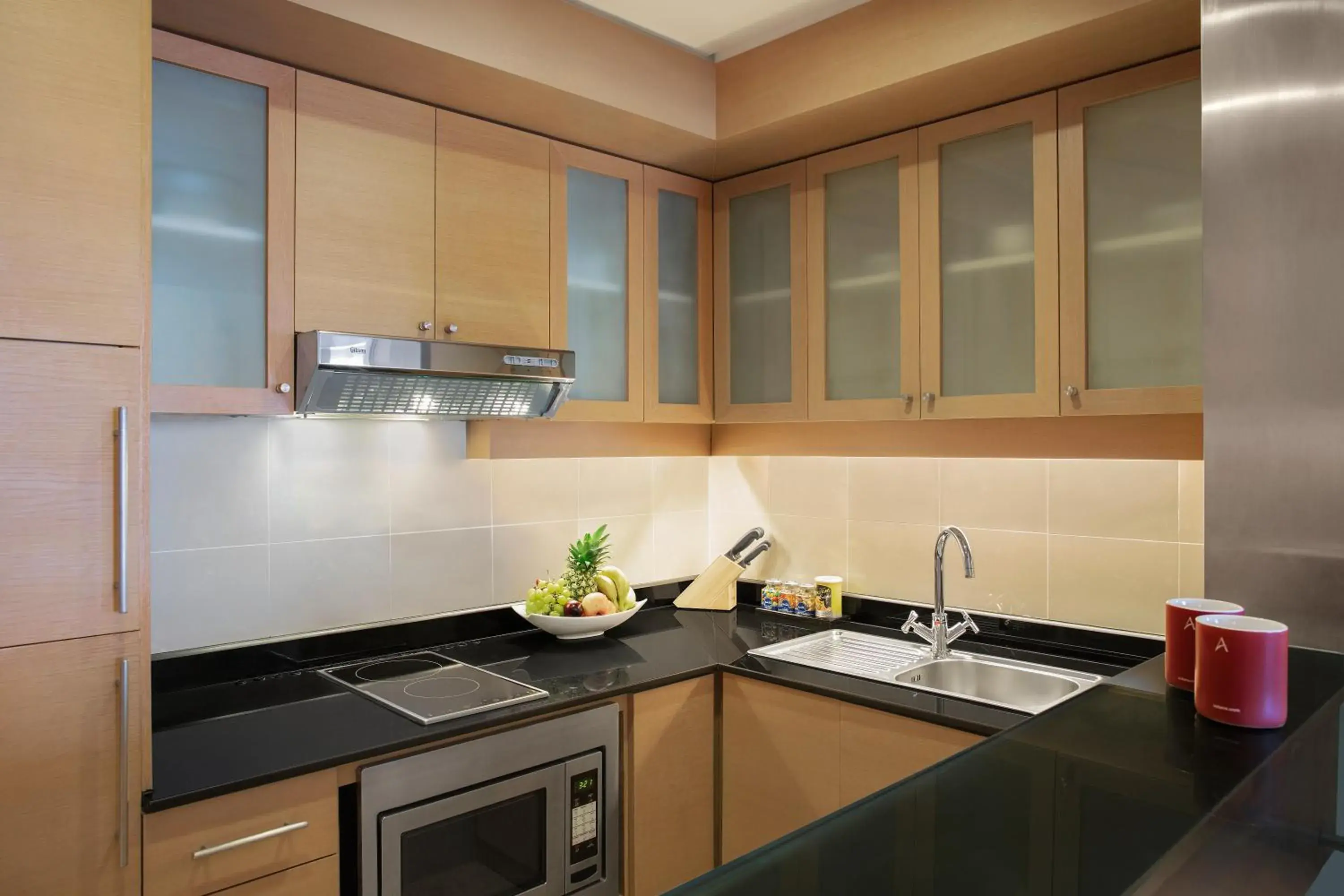 Kitchen or kitchenette in Nour Arjaan by Rotana-Fujairah Kitchen or kitchenette in Nour Arjaan by Rotana-Fujairah