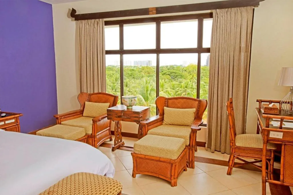 Seating area, Bed in Costabella Tropical Beach Hotel