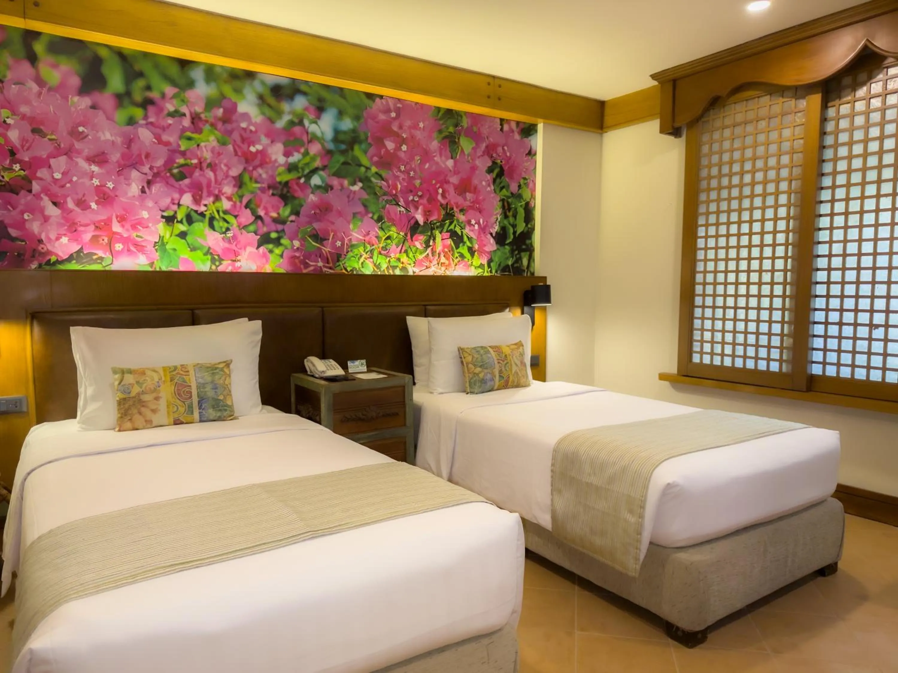 Bed in Costabella Tropical Beach Hotel