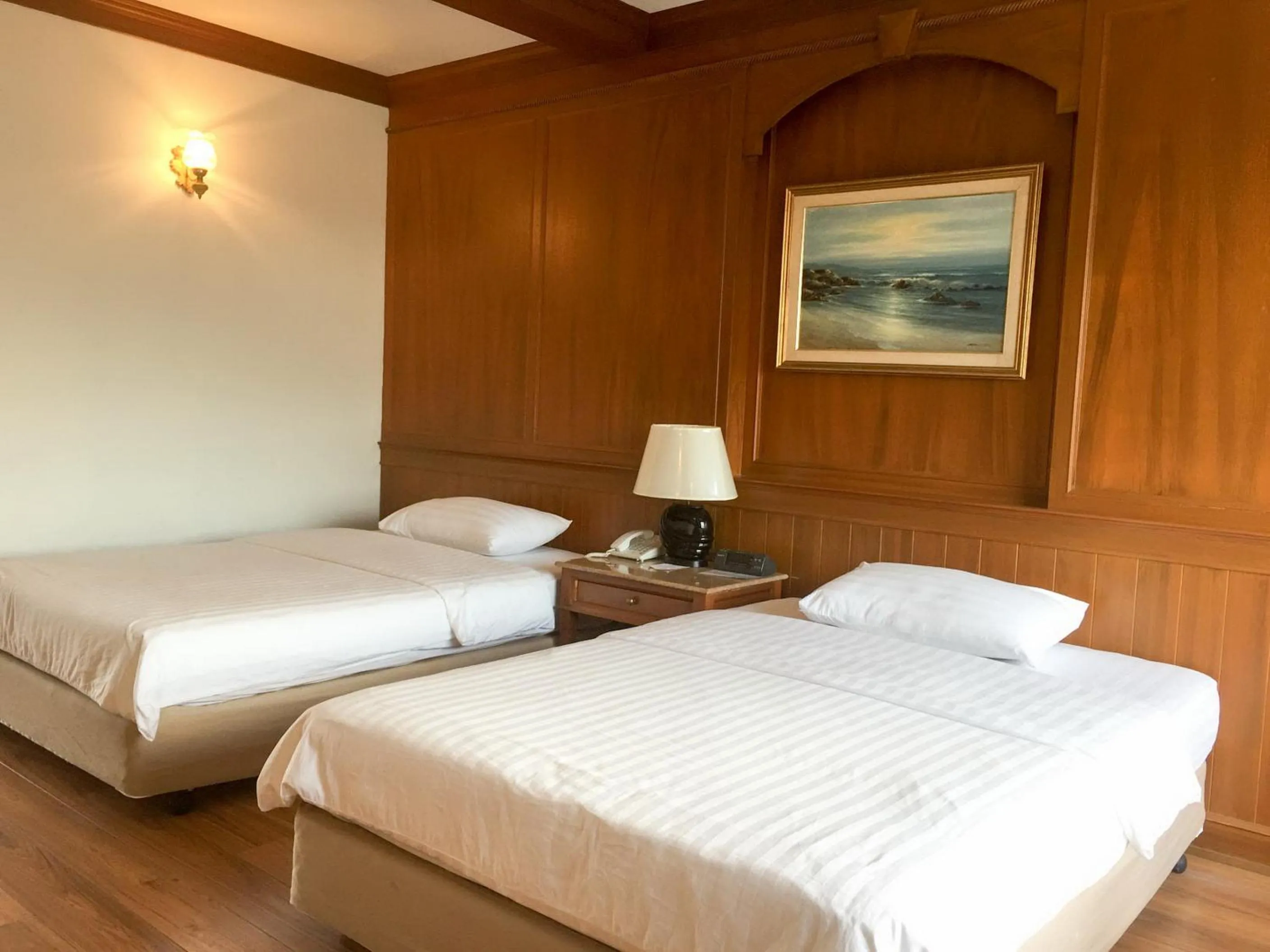 Bed in Sirin Hotel Hua Hin