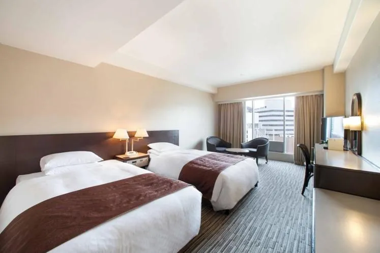 Bed in Hotel New Nagasaki