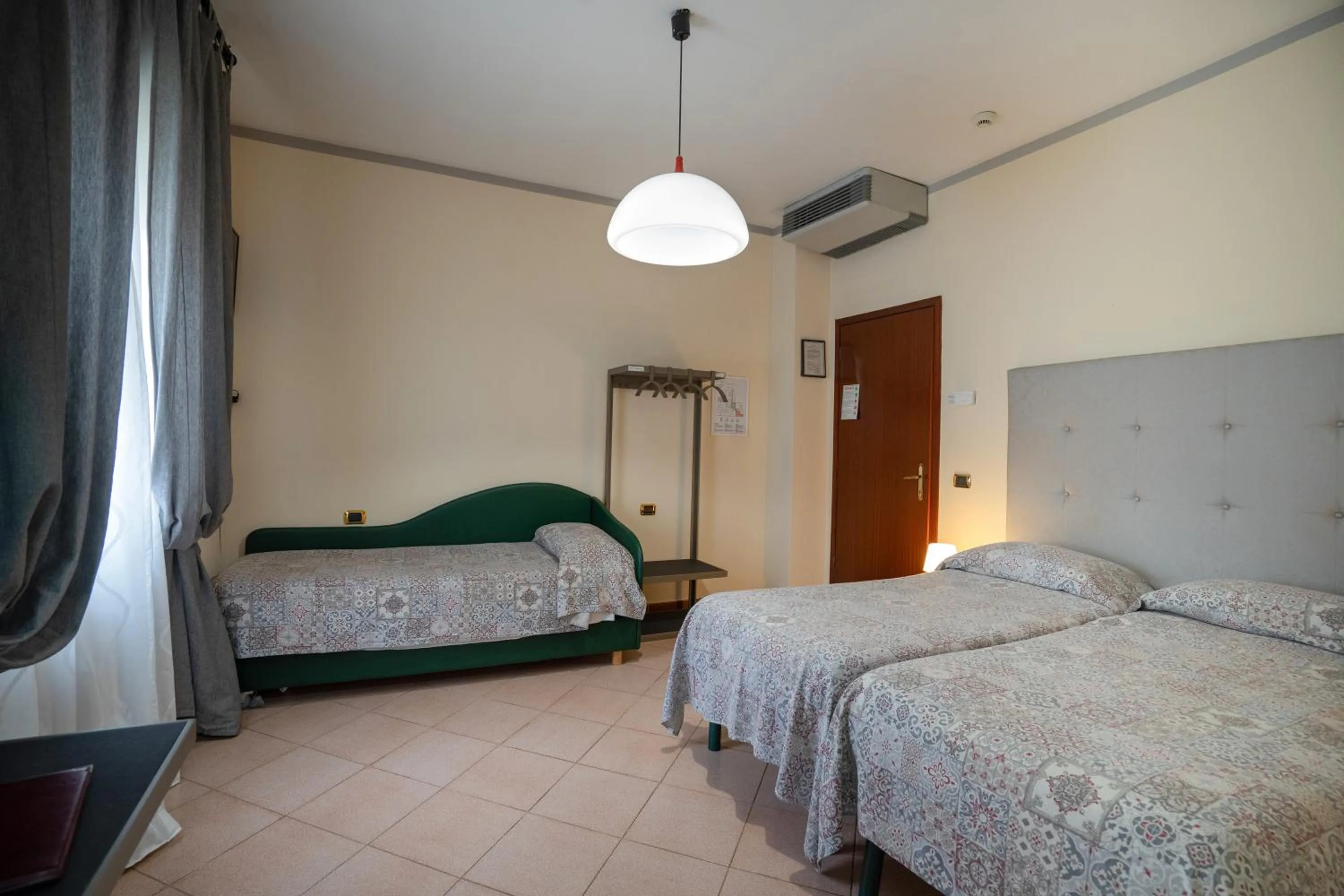 Bed in Hotel Bernardino