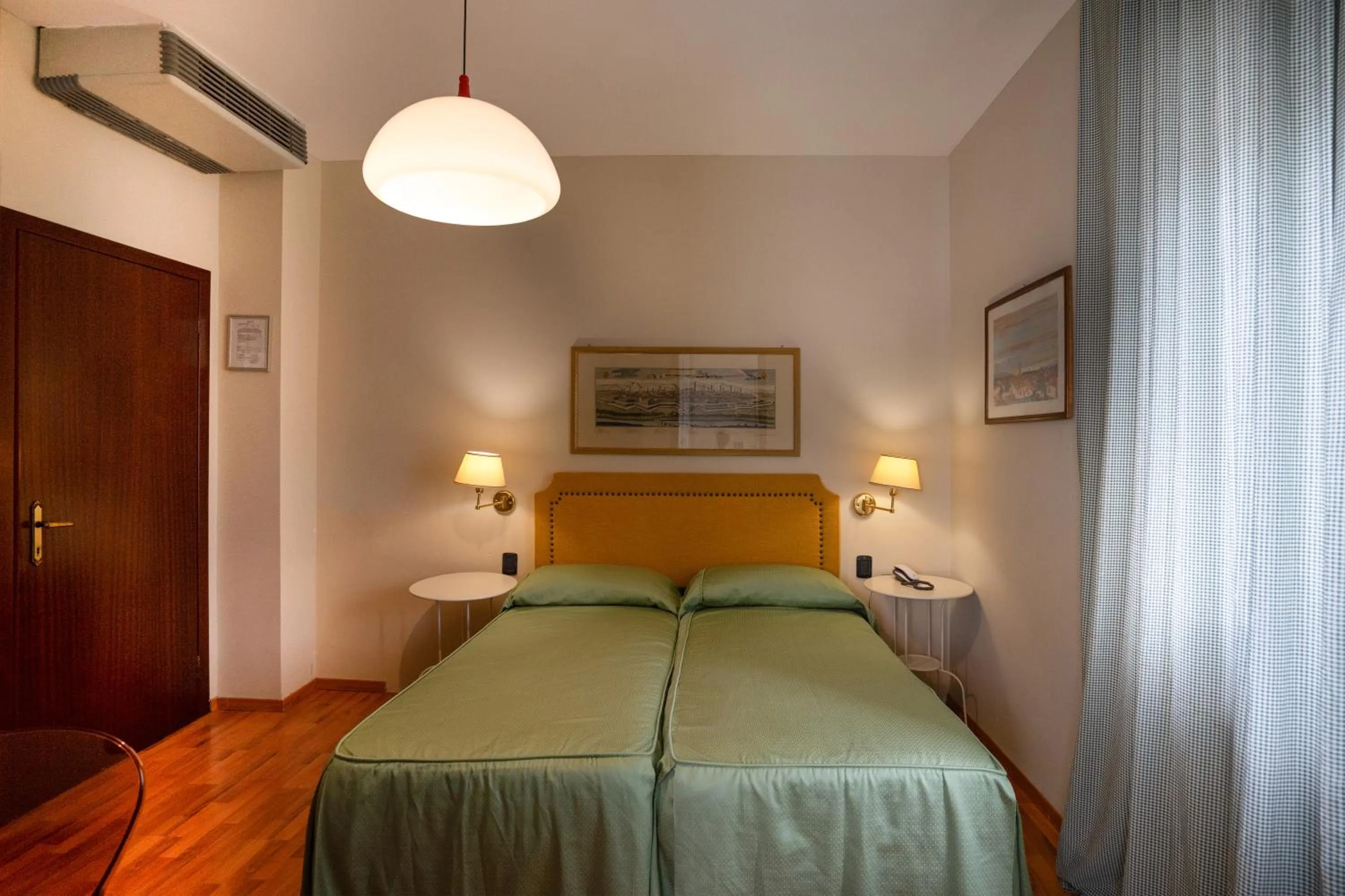 Bed in Hotel Bernardino