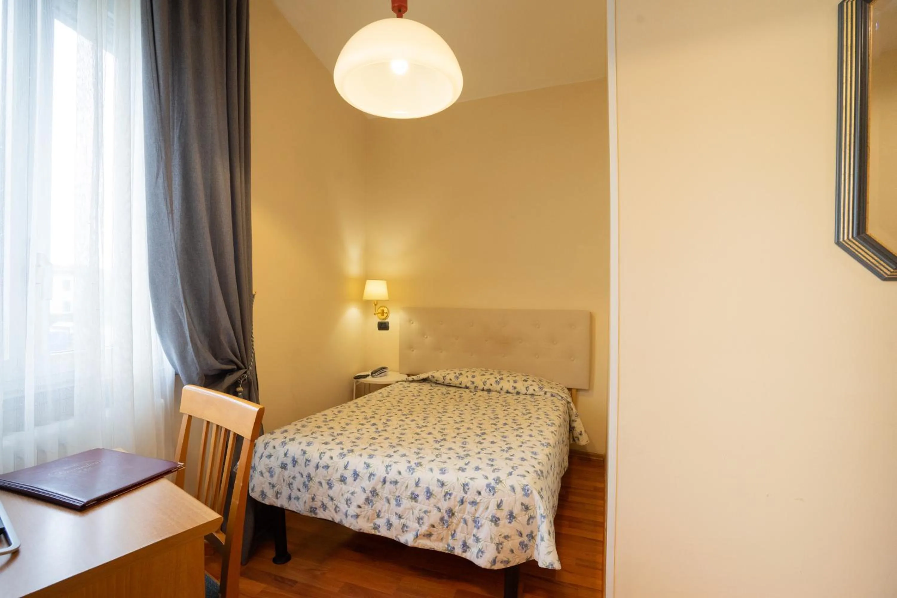 Bed in Hotel Bernardino