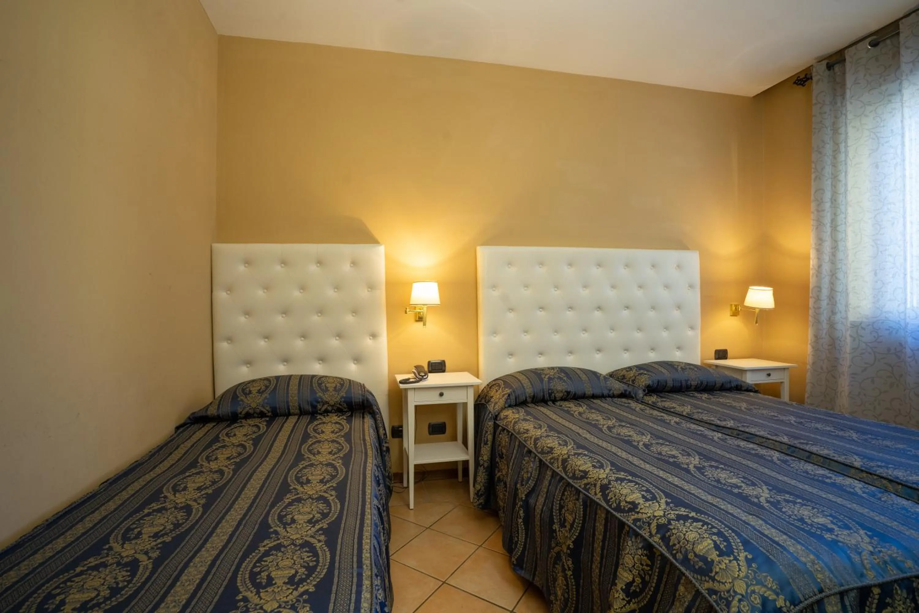 Bed in Hotel Bernardino