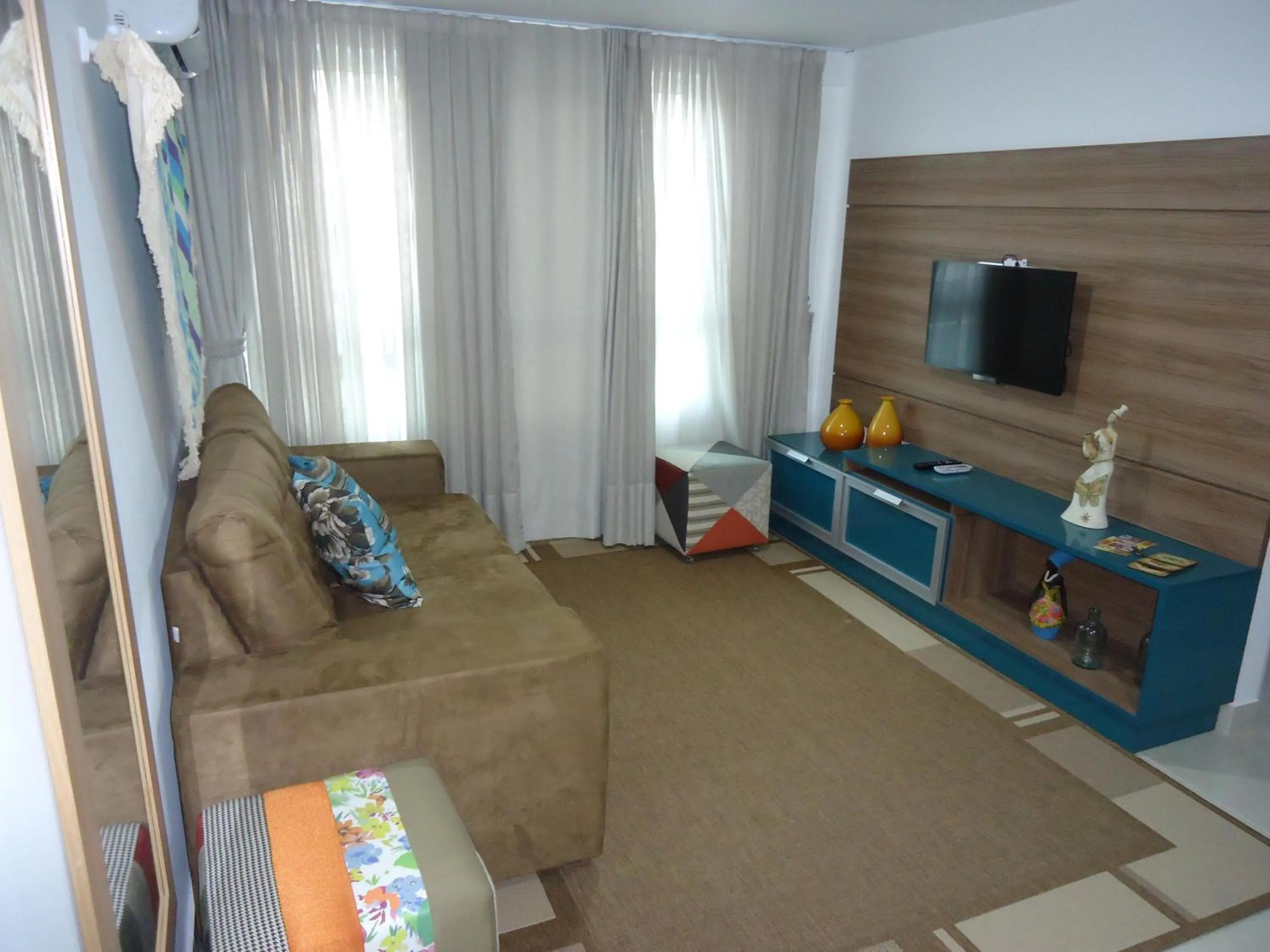 Communal lounge/ TV room in Apto Lazer