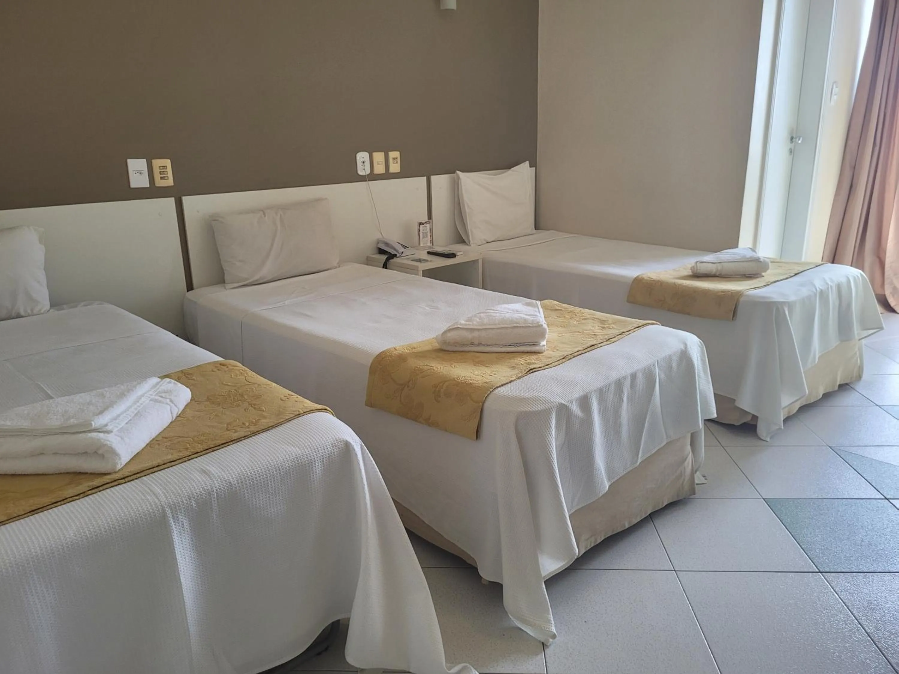Bed in Sandrin Praia Hotel