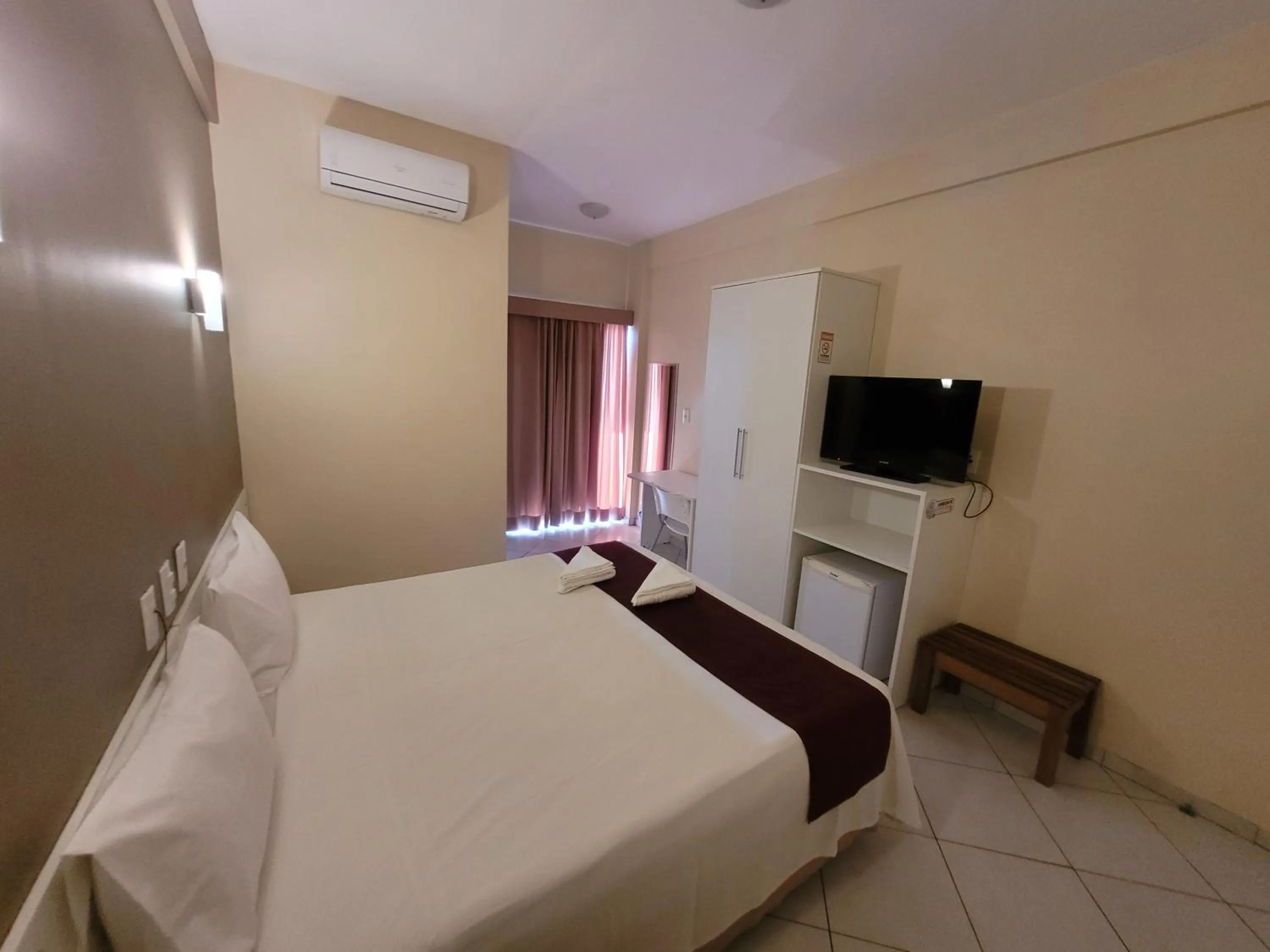 Bed in Sandrin Praia Hotel